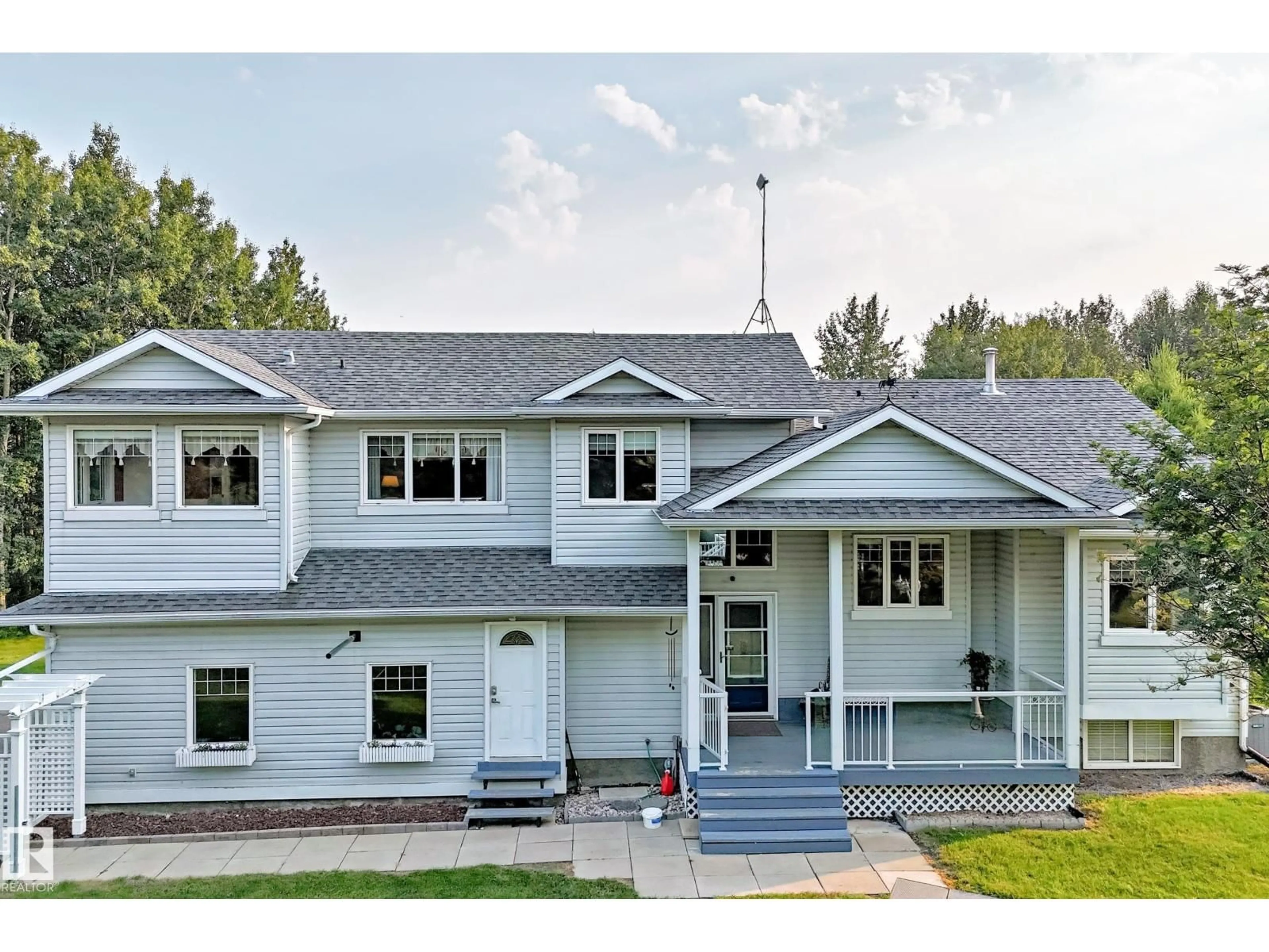 Home with vinyl exterior material, street for 8 - 26321 HGHWAY, Rural Parkland County Alberta T7Y1C7