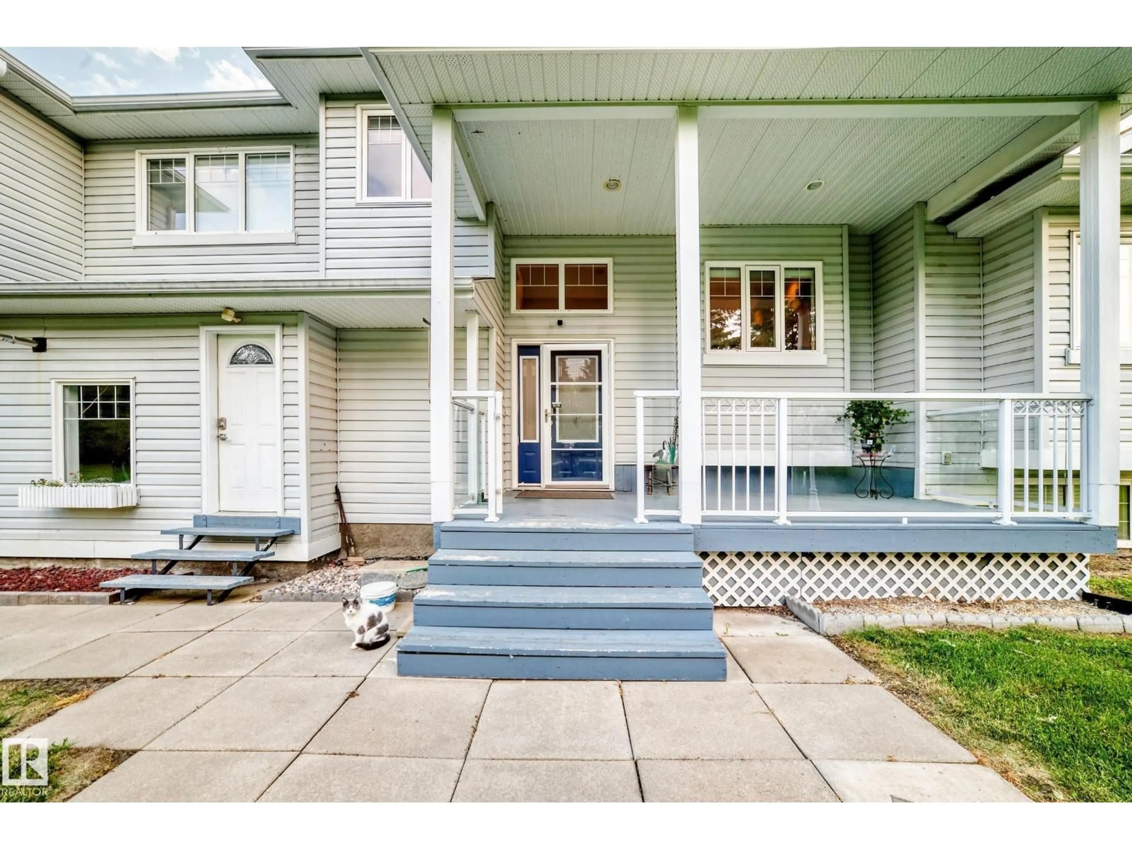 Home with vinyl exterior material, street for 8 - 26321 HGHWAY, Rural Parkland County Alberta T7Y1C7