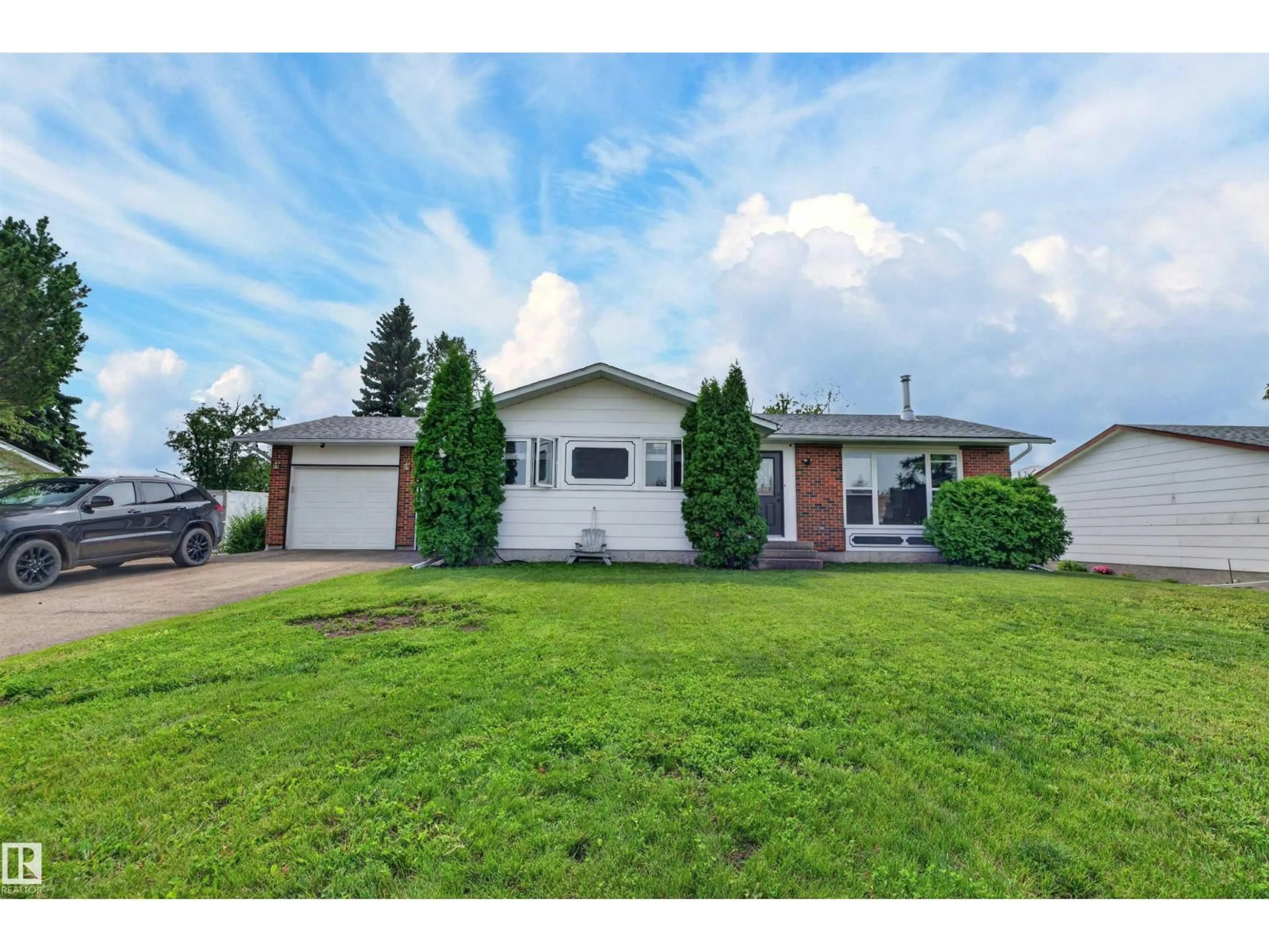 Home with vinyl exterior material, street for 5219 55 AV, Mundare Alberta T0B3H0