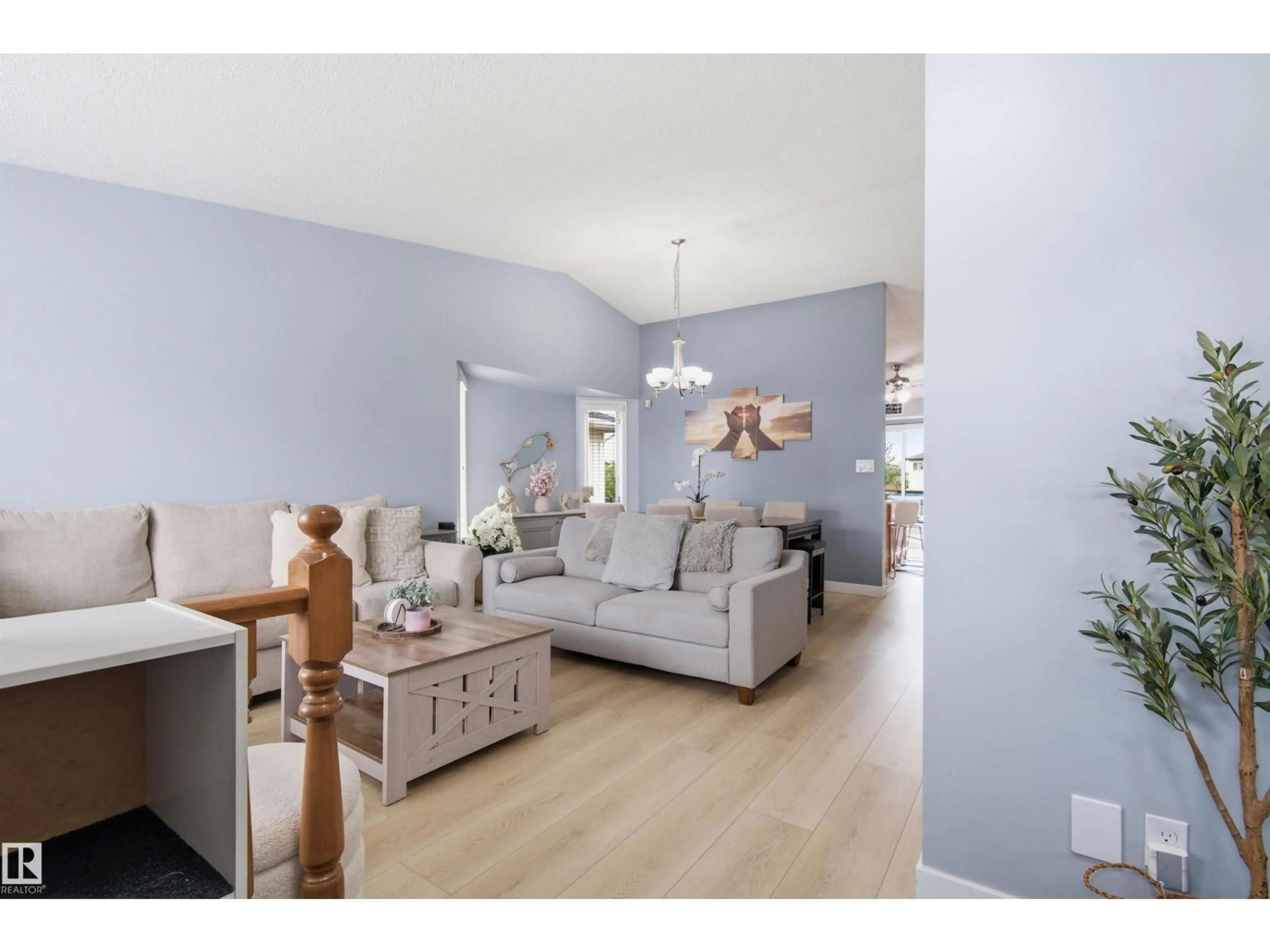 Living room with furniture, wood/laminate floor for NW - 6224 162B AV, Edmonton Alberta T5Y2S1