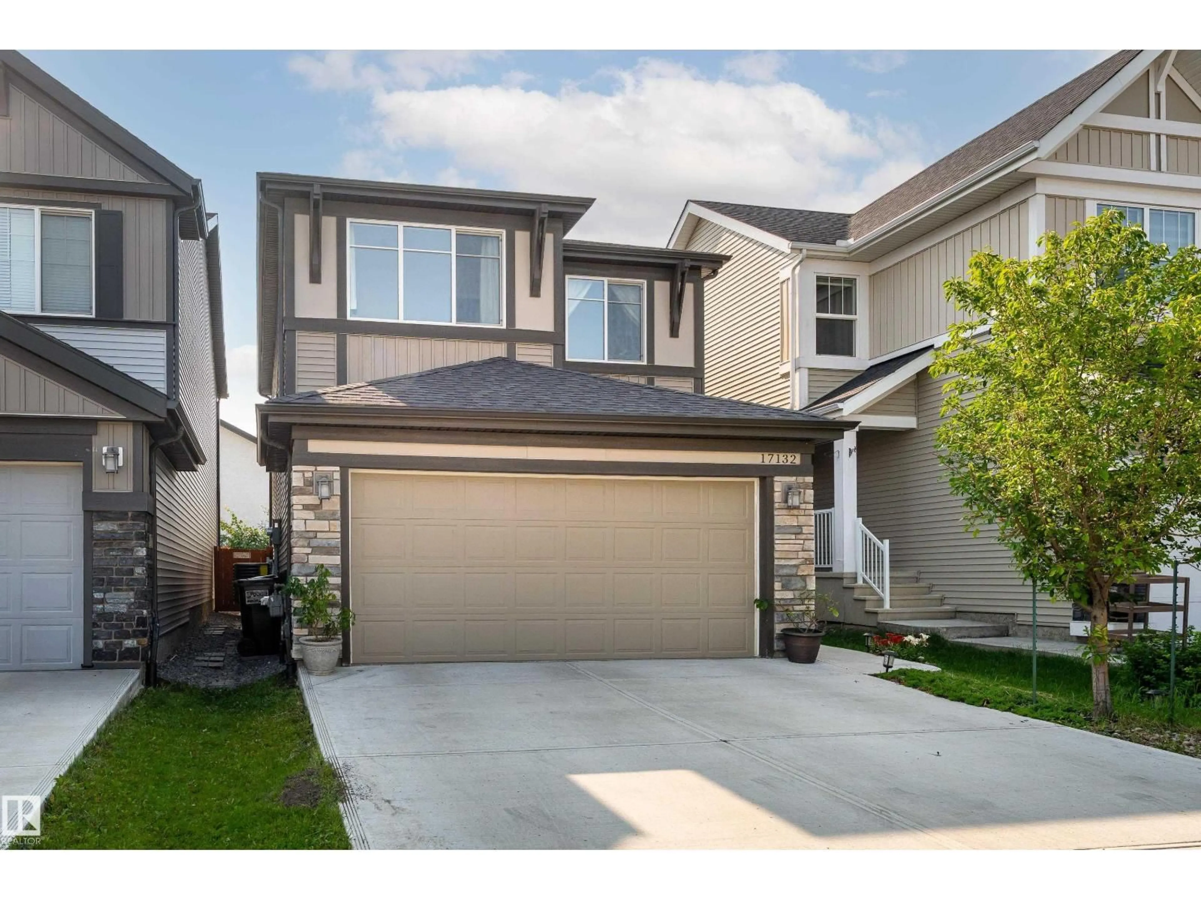 Home with vinyl exterior material, street for 17132 64 ST, Edmonton Alberta T5Y3T6