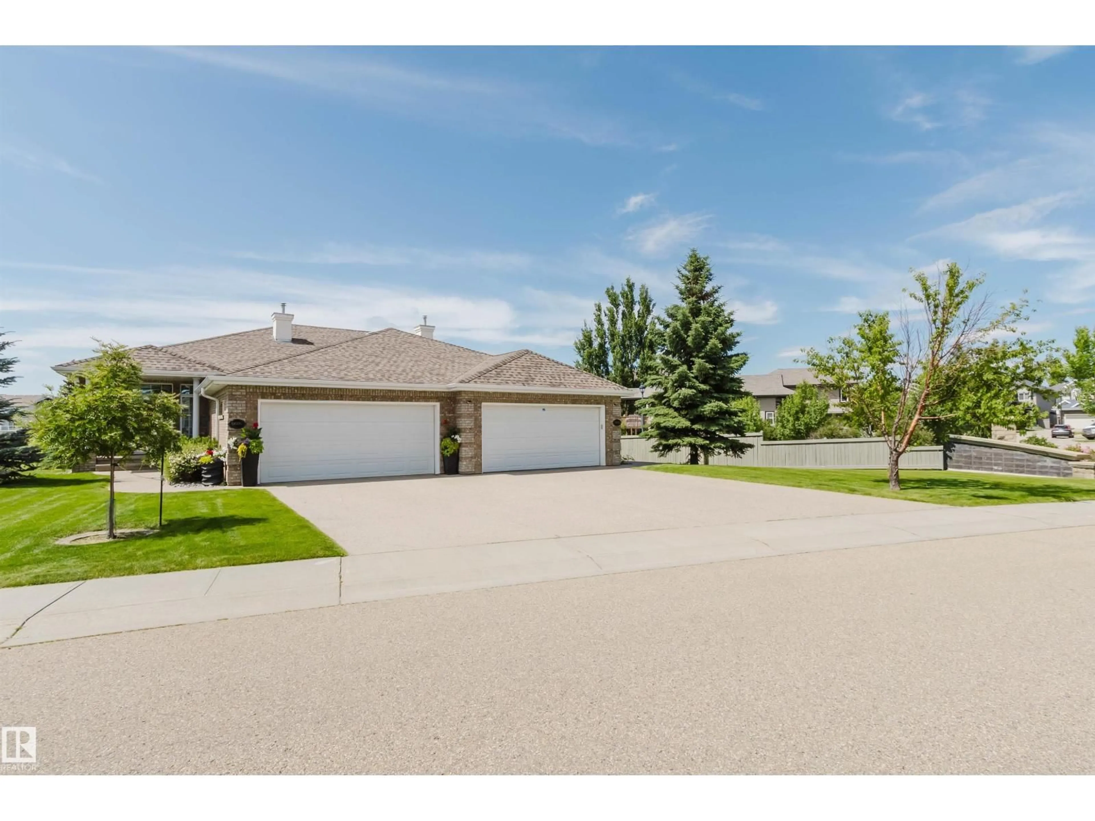 A pic from outside/outdoor area/front of a property/back of a property/a pic from drone, water/lake/river/ocean view for 6604 SANDIN CV, Edmonton Alberta T6R0G2