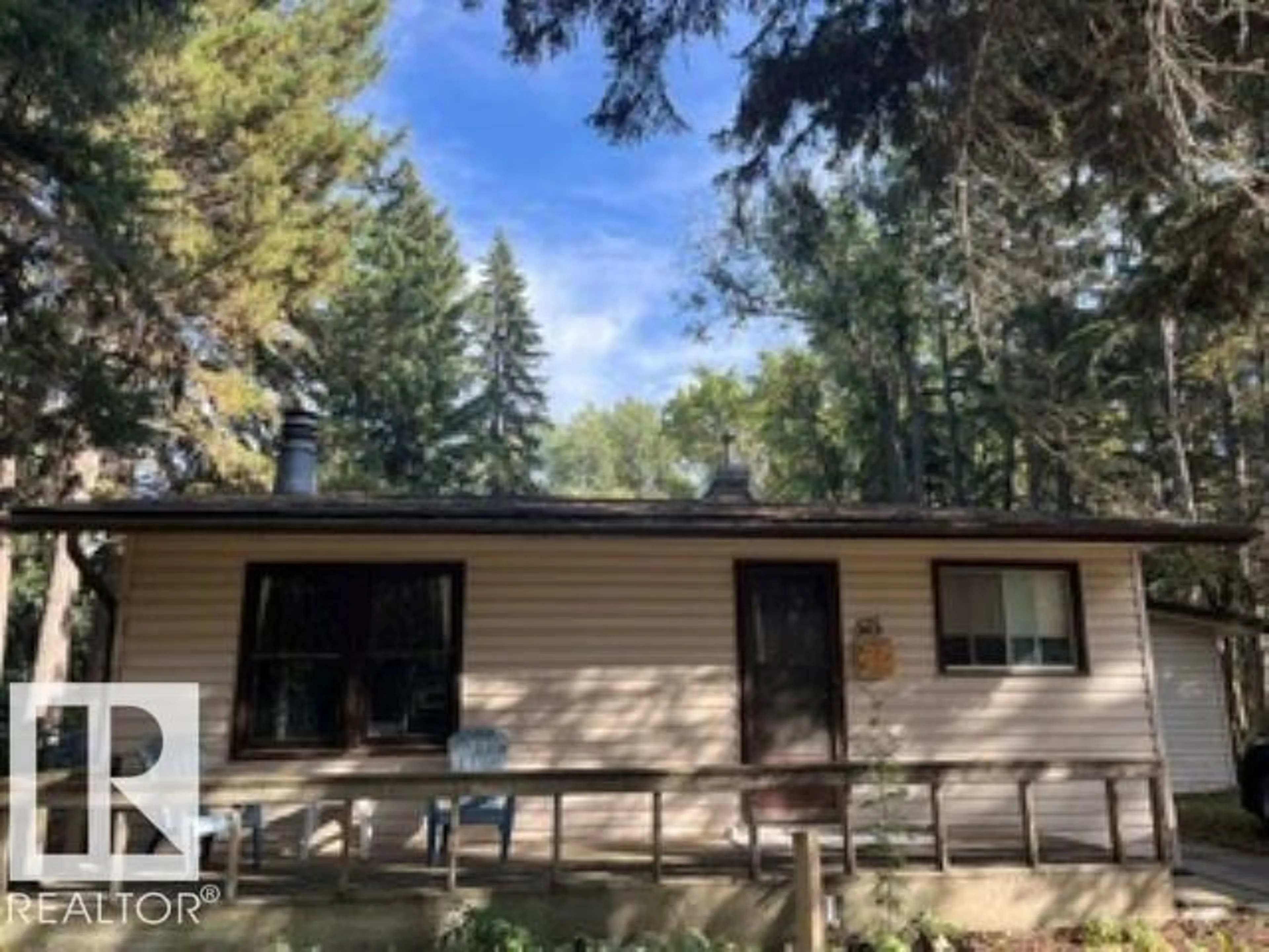 Home with vinyl exterior material, forest/trees view for 515 5TH ST, Rural Wetaskiwin County Alberta T0C2V0