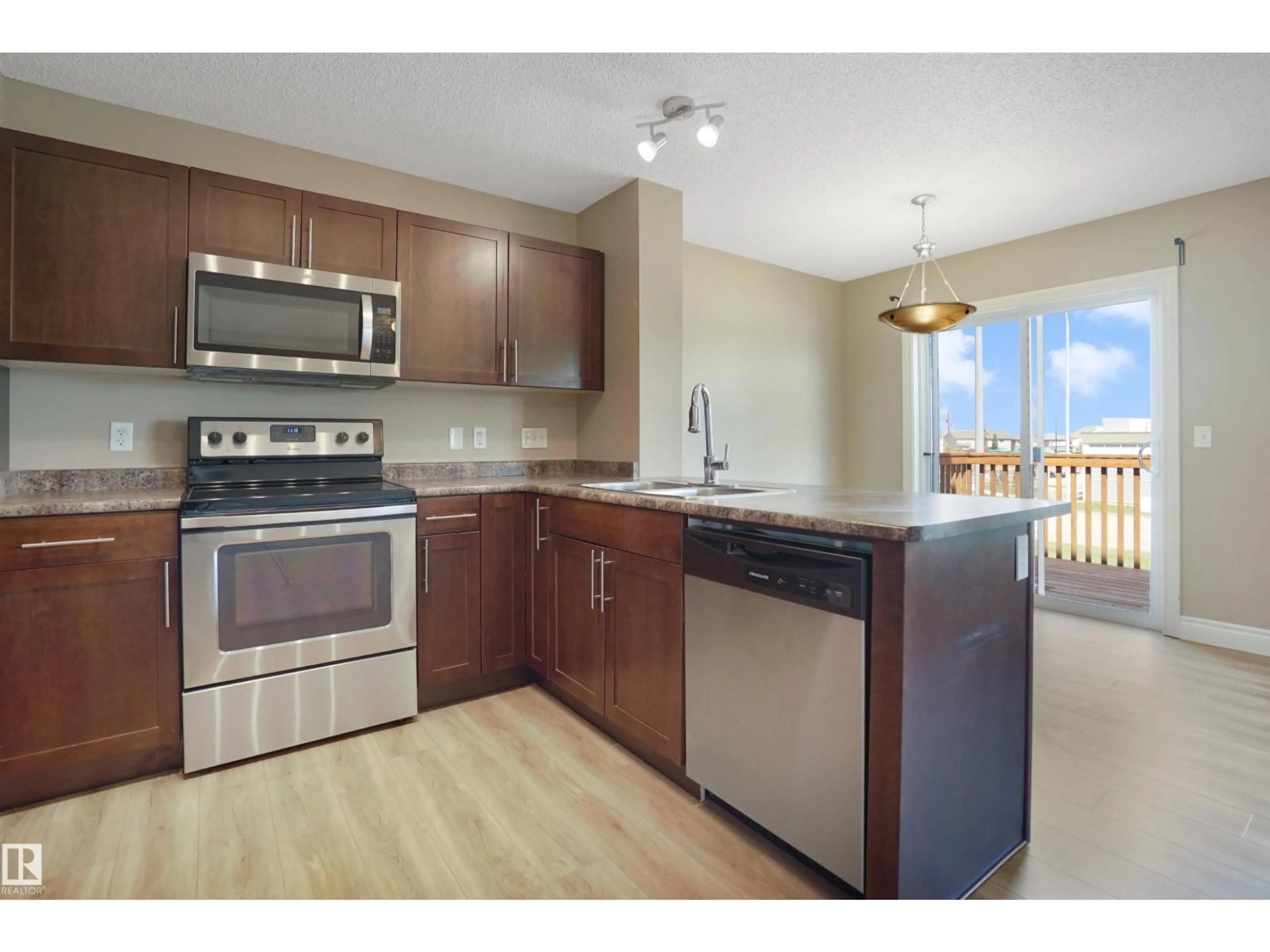 Standard kitchen, wood/laminate floor for 33 BRINTNELL BV, Edmonton Alberta T5Y0V5