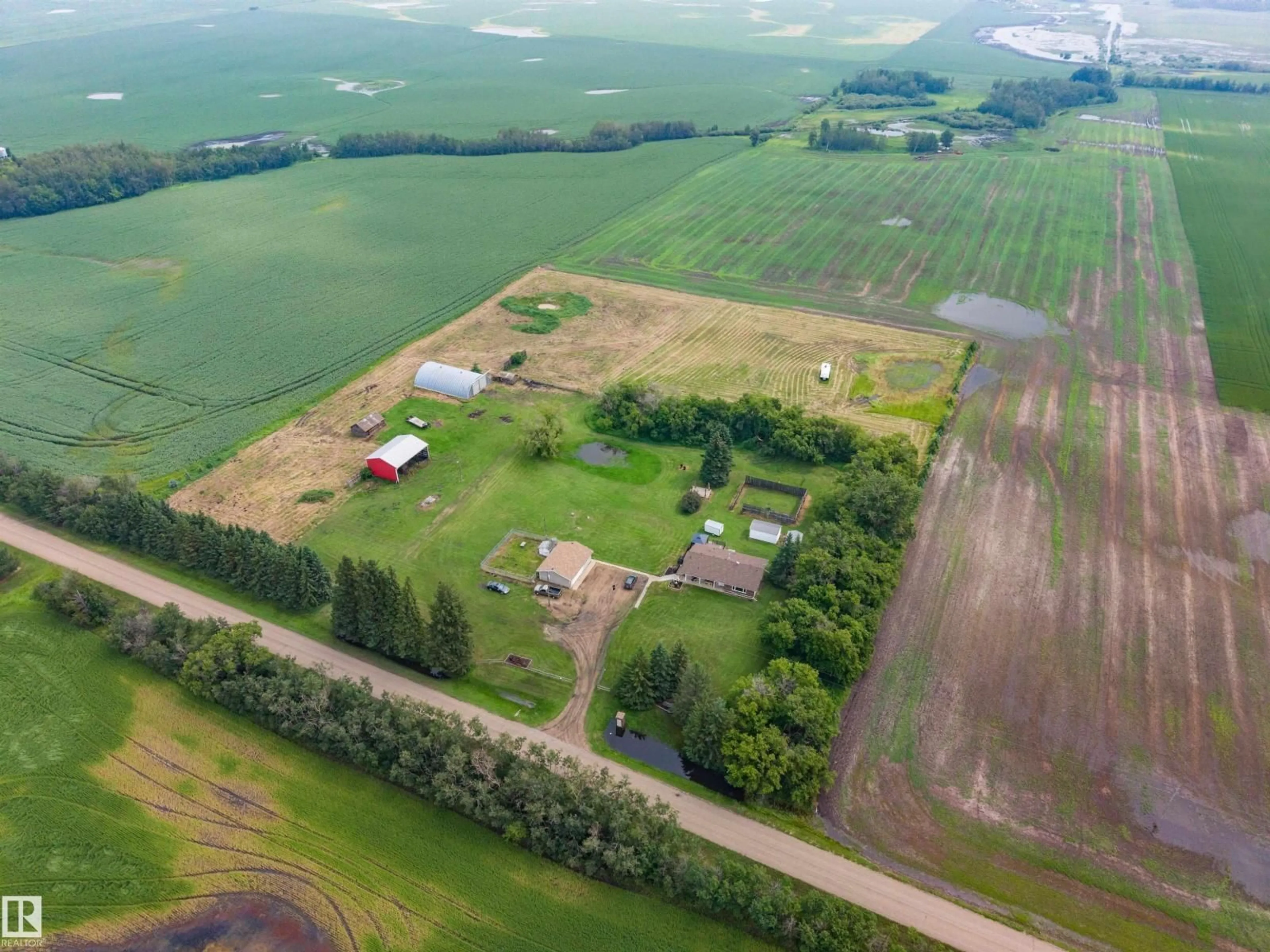 A pic from outside/outdoor area/front of a property/back of a property/a pic from drone, unknown for 54433 RGE ROAD 213, Rural Strathcona County Alberta T8L3Z5