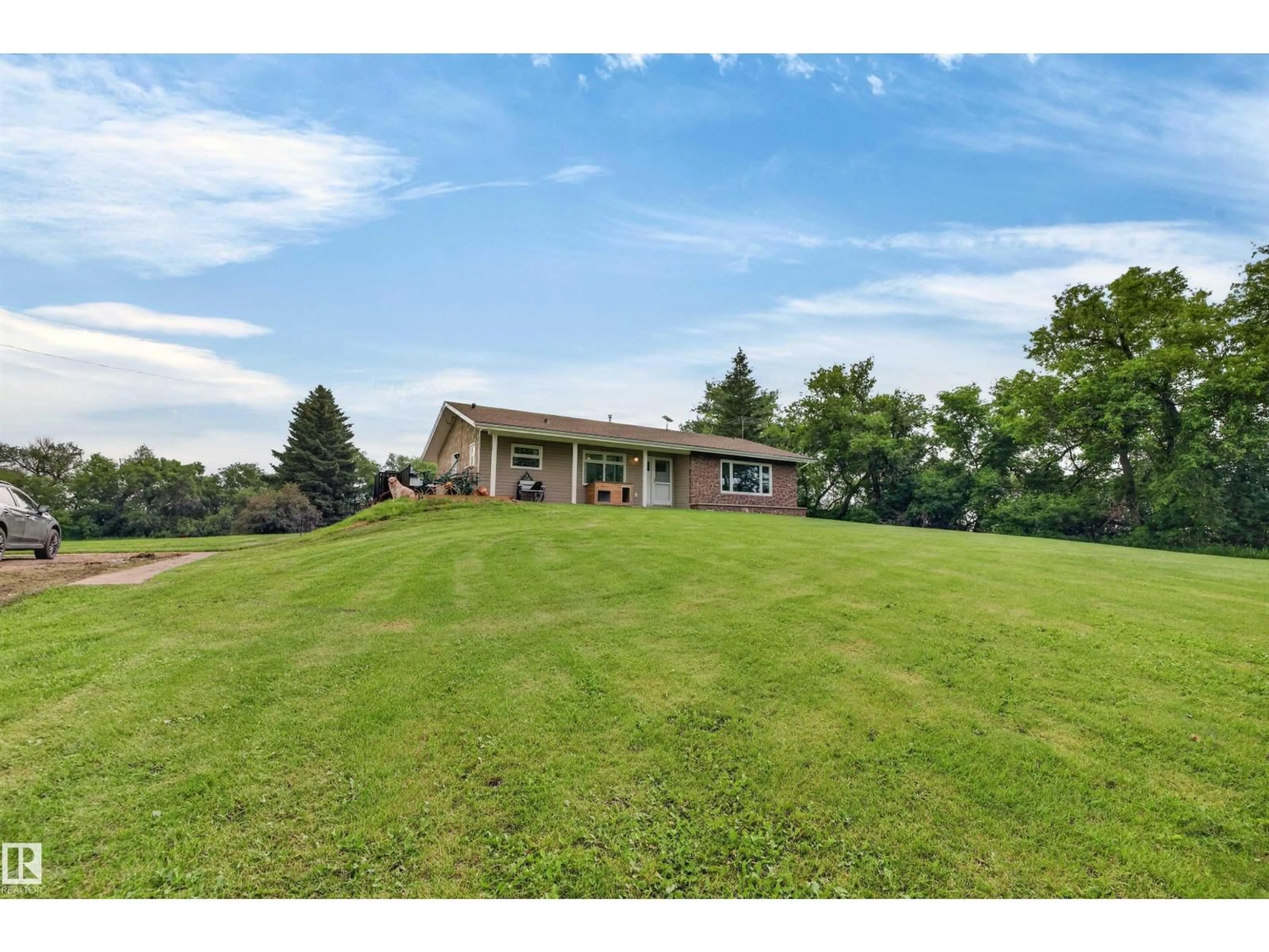 A pic from outside/outdoor area/front of a property/back of a property/a pic from drone, water/lake/river/ocean view for 54433 RGE ROAD 213, Rural Strathcona County Alberta T8L3Z5