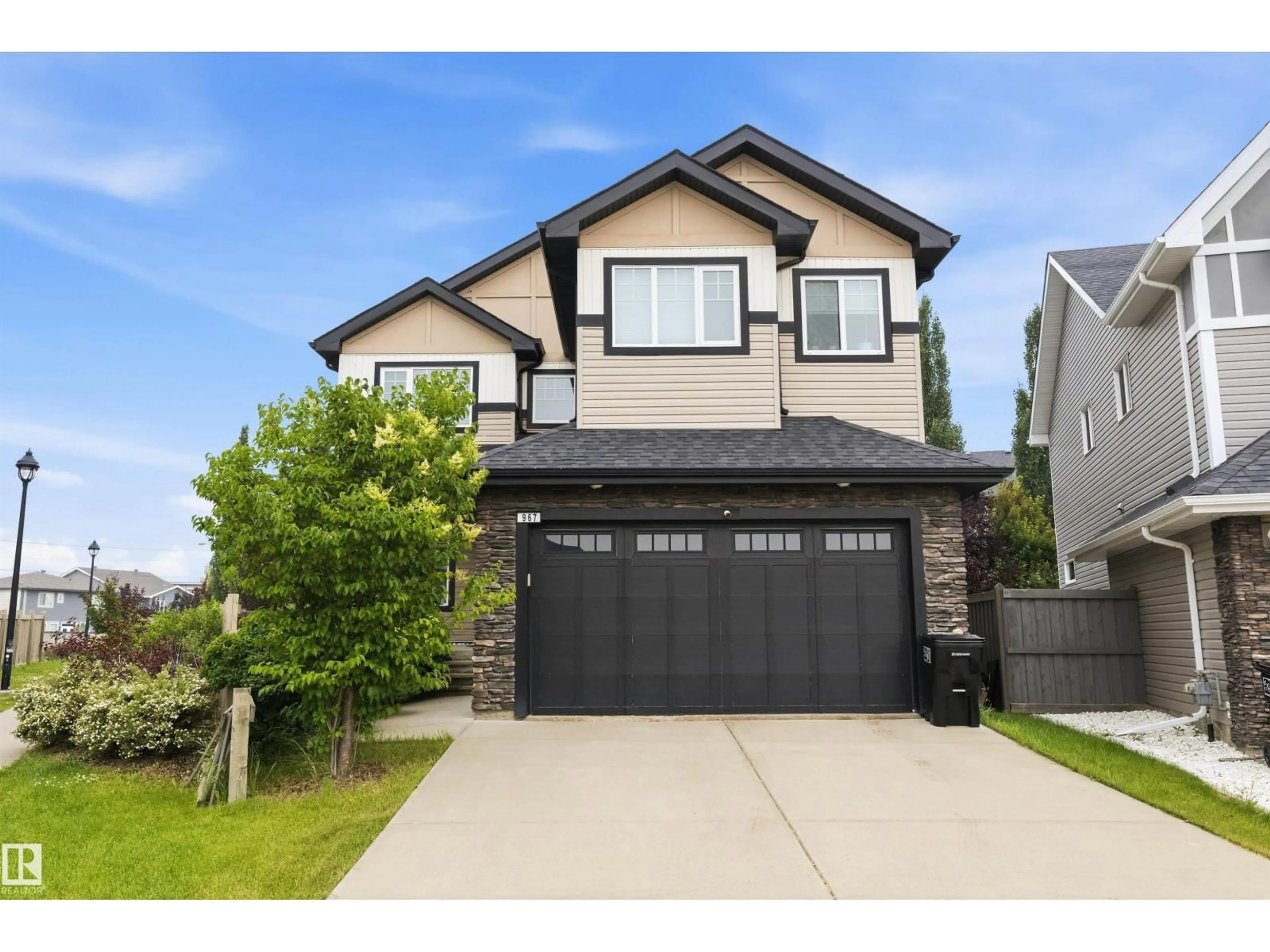Home with vinyl exterior material, street for SW - 967 175 ST, Edmonton Alberta T6W1Z8