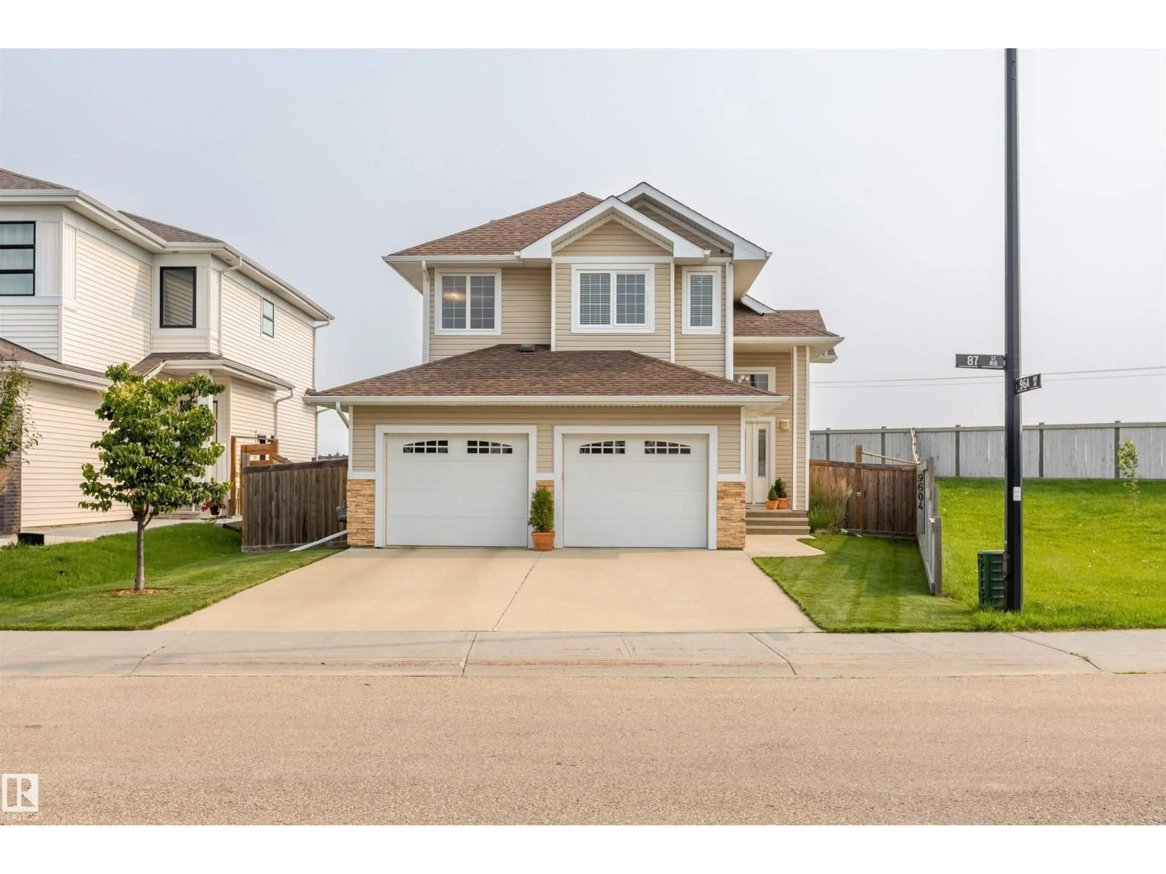 Home with vinyl exterior material, street for 9604 87 ST, Morinville Alberta T8R0C5