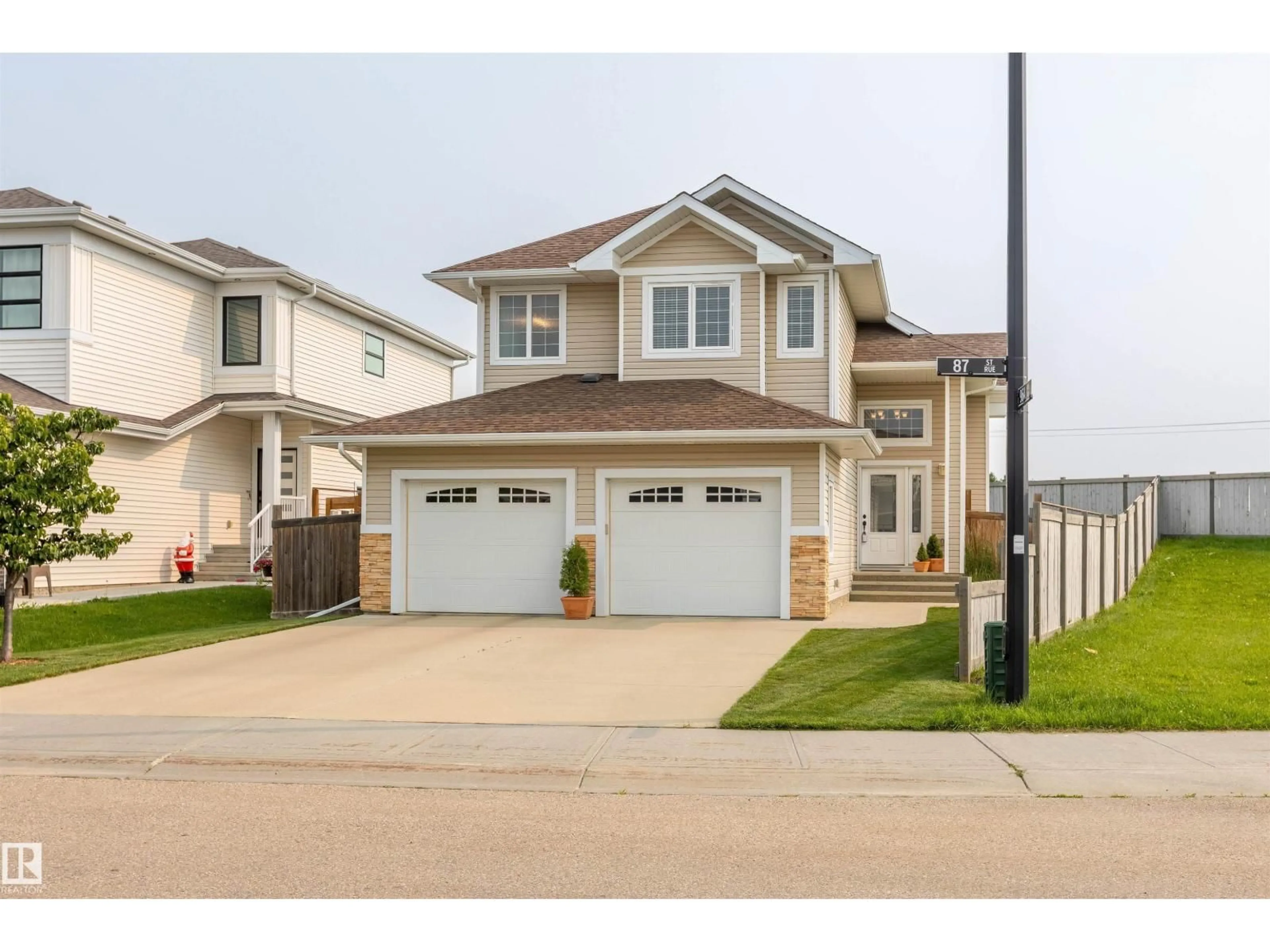 Home with vinyl exterior material, street for 9604 87 ST, Morinville Alberta T8R0C5
