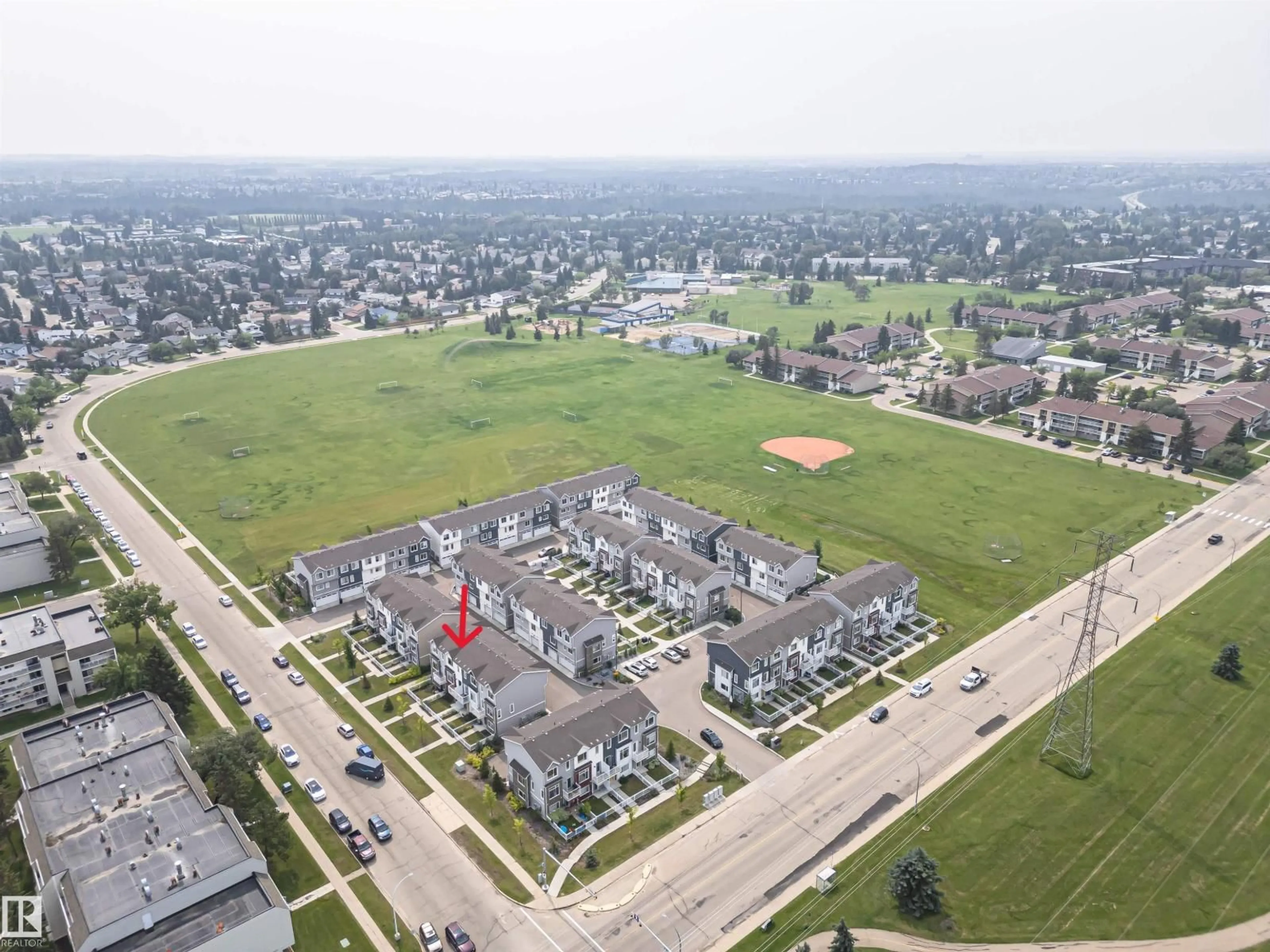 A pic from outside/outdoor area/front of a property/back of a property/a pic from drone, street for 61 215 SADDLEBACK RD, Edmonton Alberta T6J5T6
