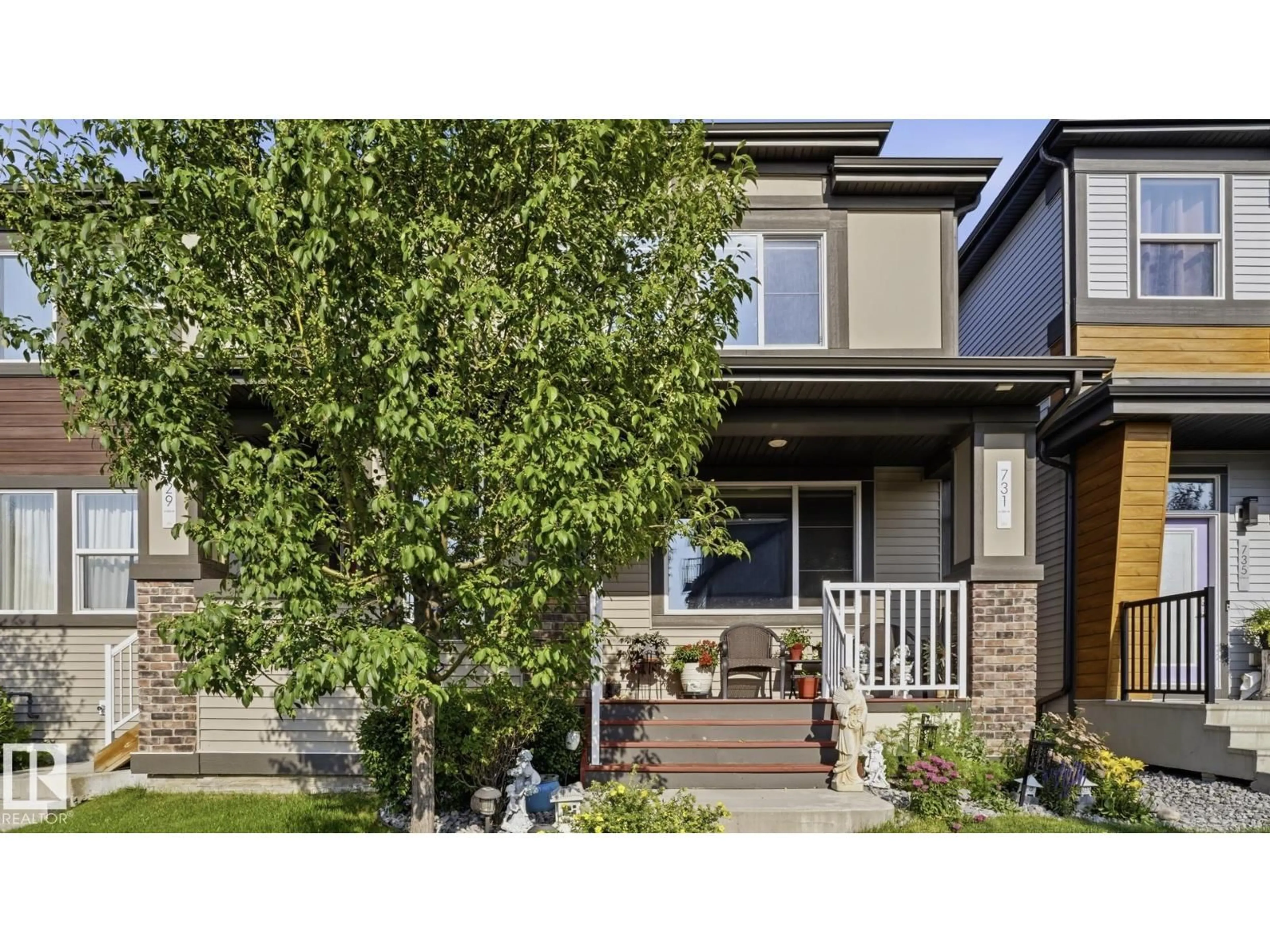 Home with vinyl exterior material, street for SW - 731 36 ST, Edmonton Alberta T6X2G6