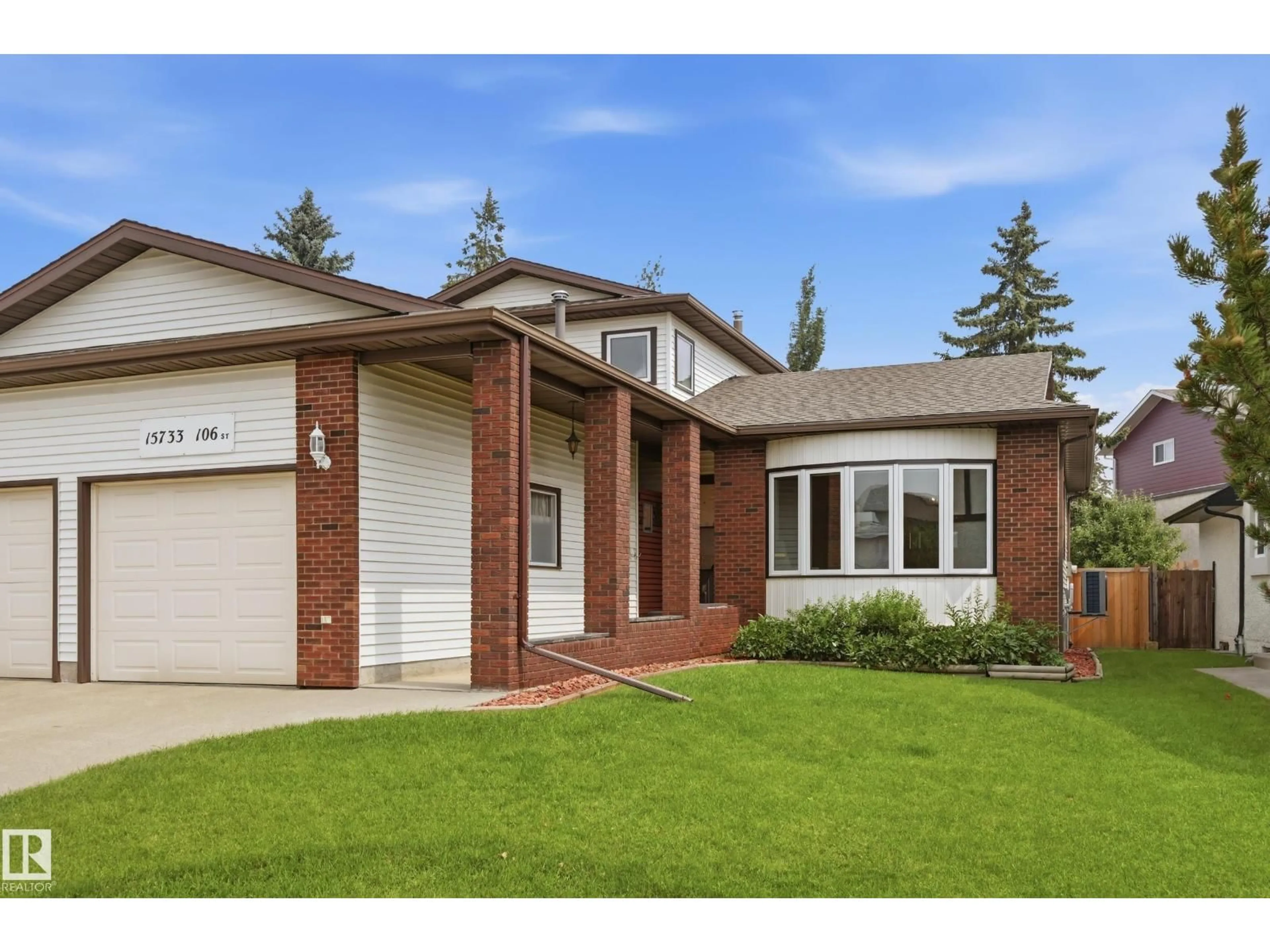 Home with brick exterior material, street for 15733 106 ST, Edmonton Alberta T5X5B5