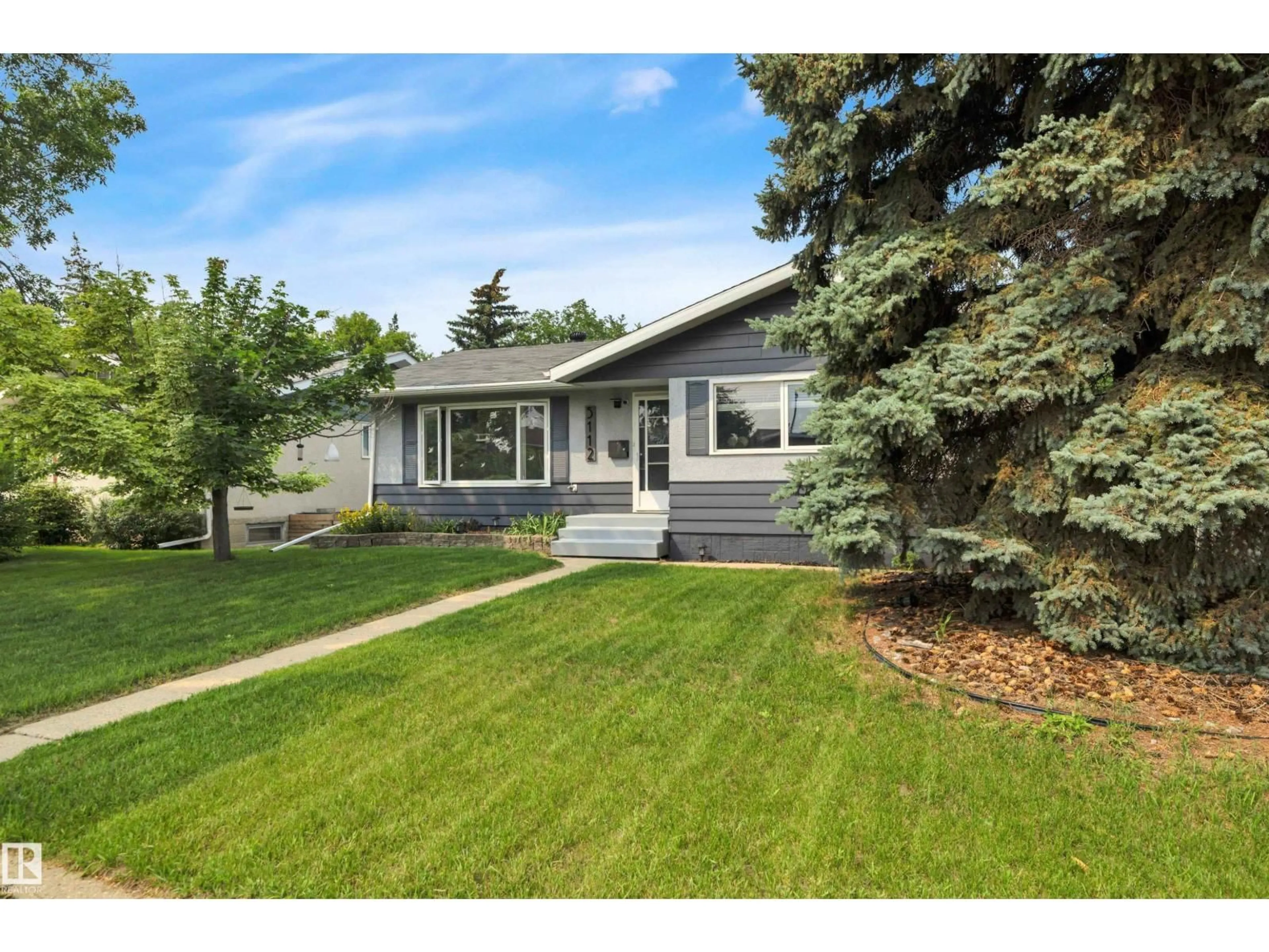 Home with vinyl exterior material, street for 5112 43 AV, Leduc Alberta T9E5A4