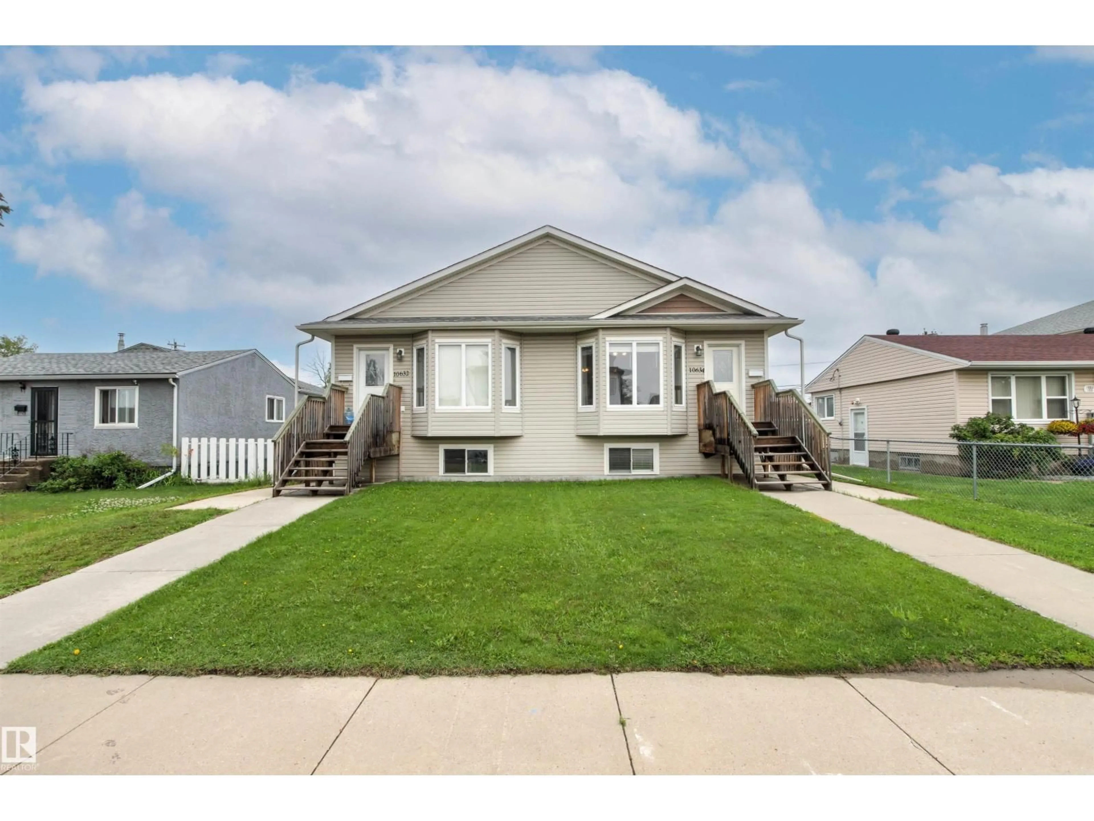 Home with vinyl exterior material, street for NW - 10634 155 ST, Edmonton Alberta T5P2M5