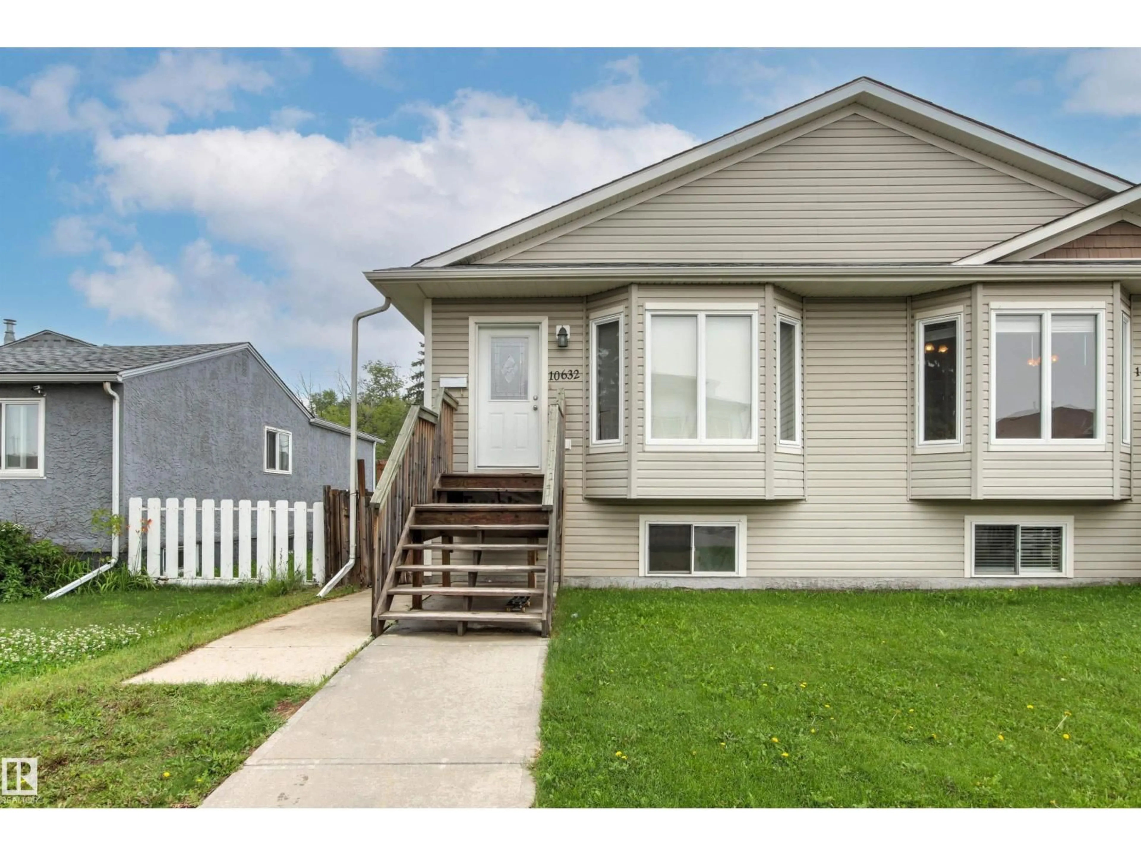 Home with vinyl exterior material, street for 10632 155 ST, Edmonton Alberta T5P2M5