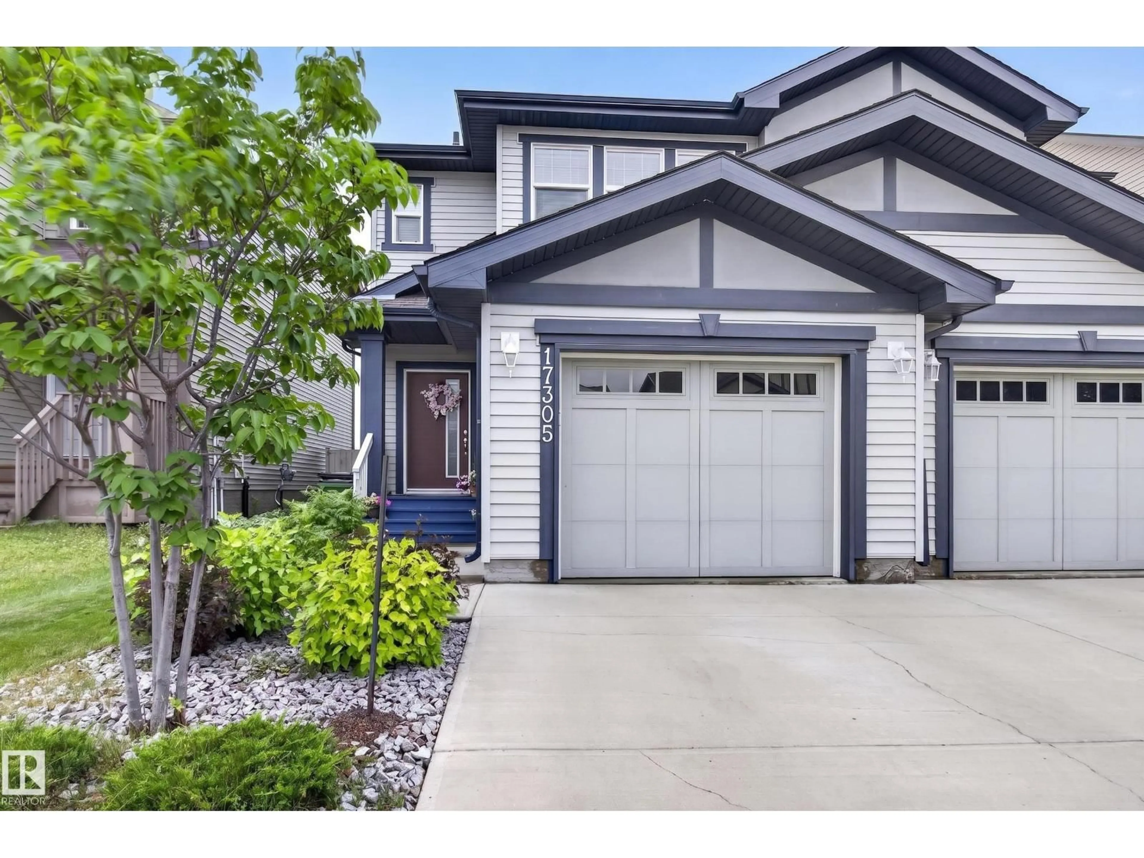 Home with vinyl exterior material, street for 17305 73 ST, Edmonton Alberta T5Z0L3