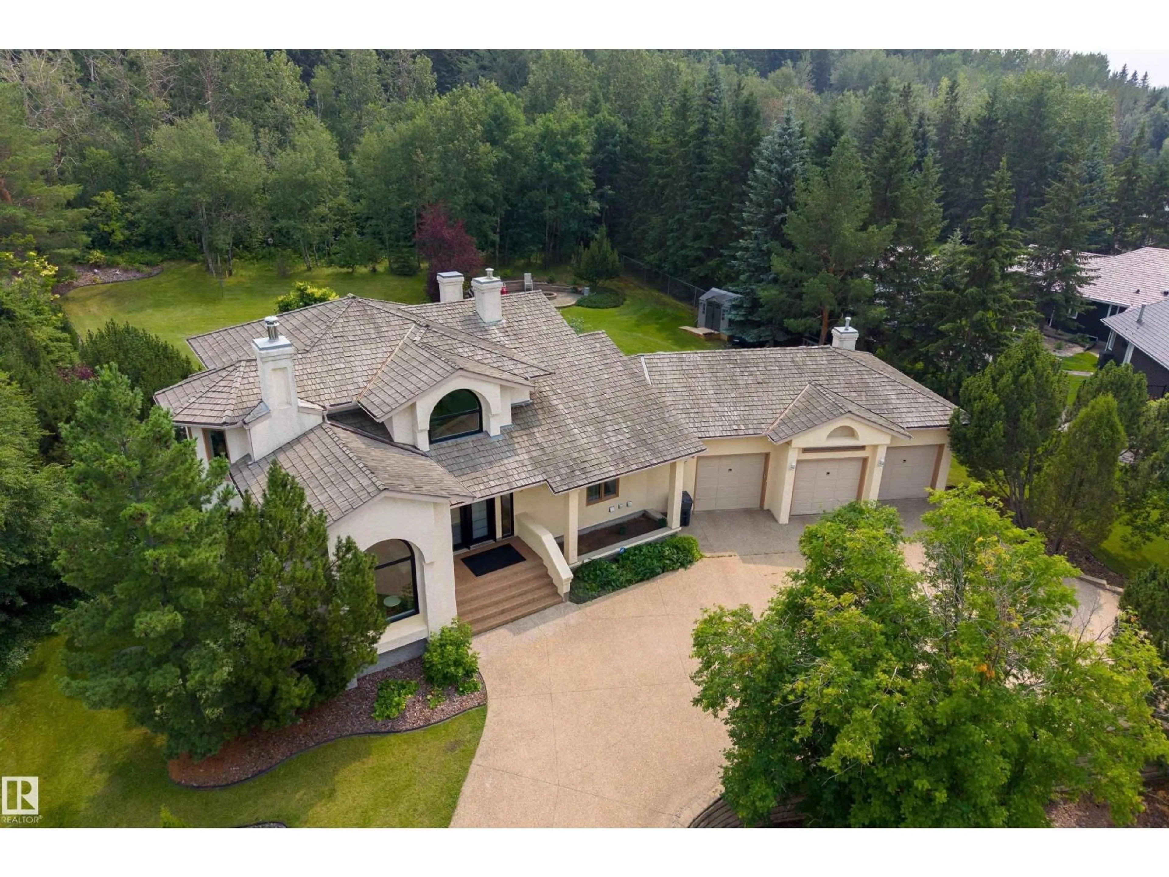 A pic from outside/outdoor area/front of a property/back of a property/a pic from drone, unknown for 45 - 25112 TWP ROAD 542A, Rural Sturgeon County Alberta T8T0B2
