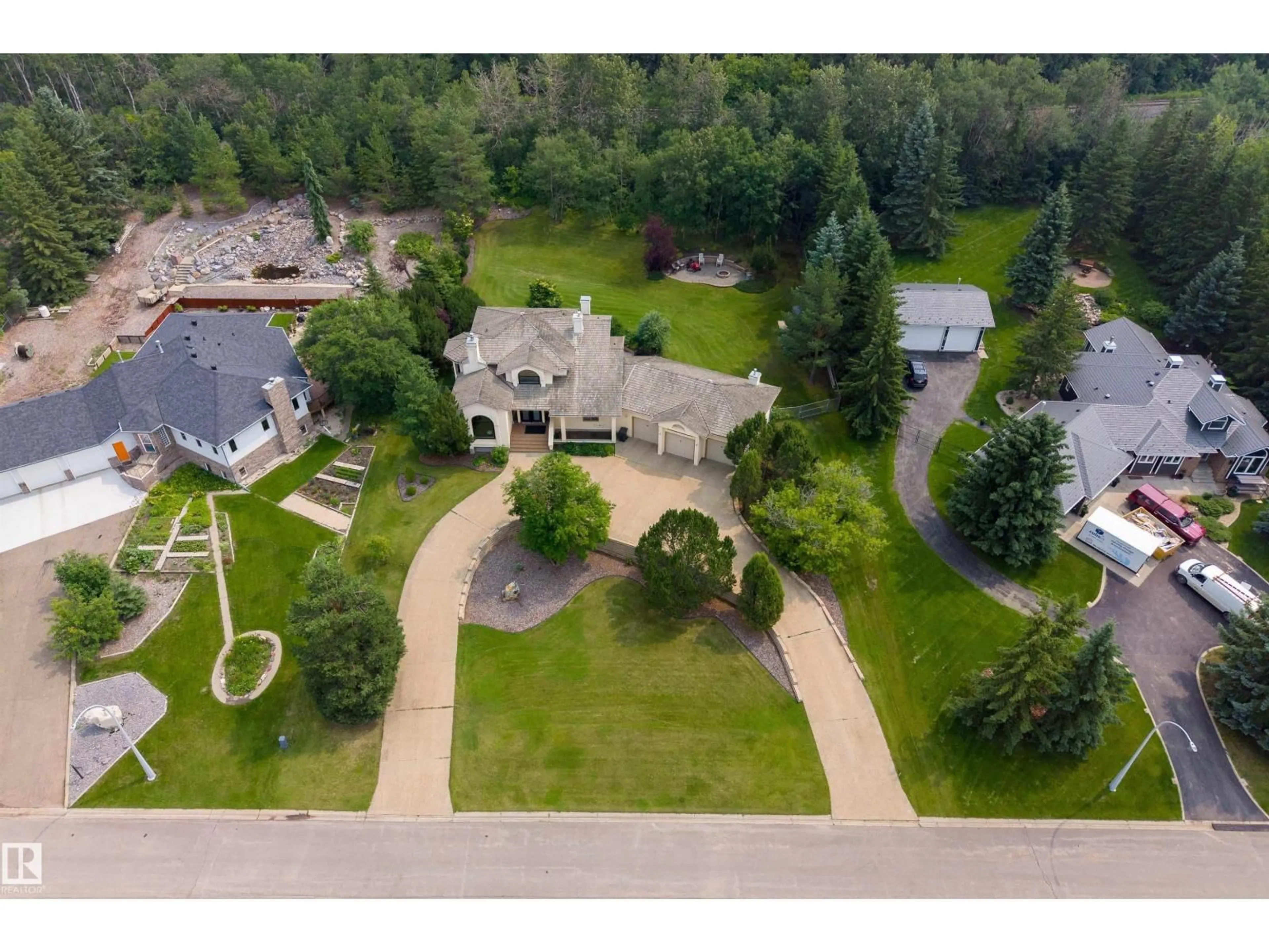 A pic from outside/outdoor area/front of a property/back of a property/a pic from drone, unknown for 45 - 25112 TWP ROAD 542A, Rural Sturgeon County Alberta T8T0B2