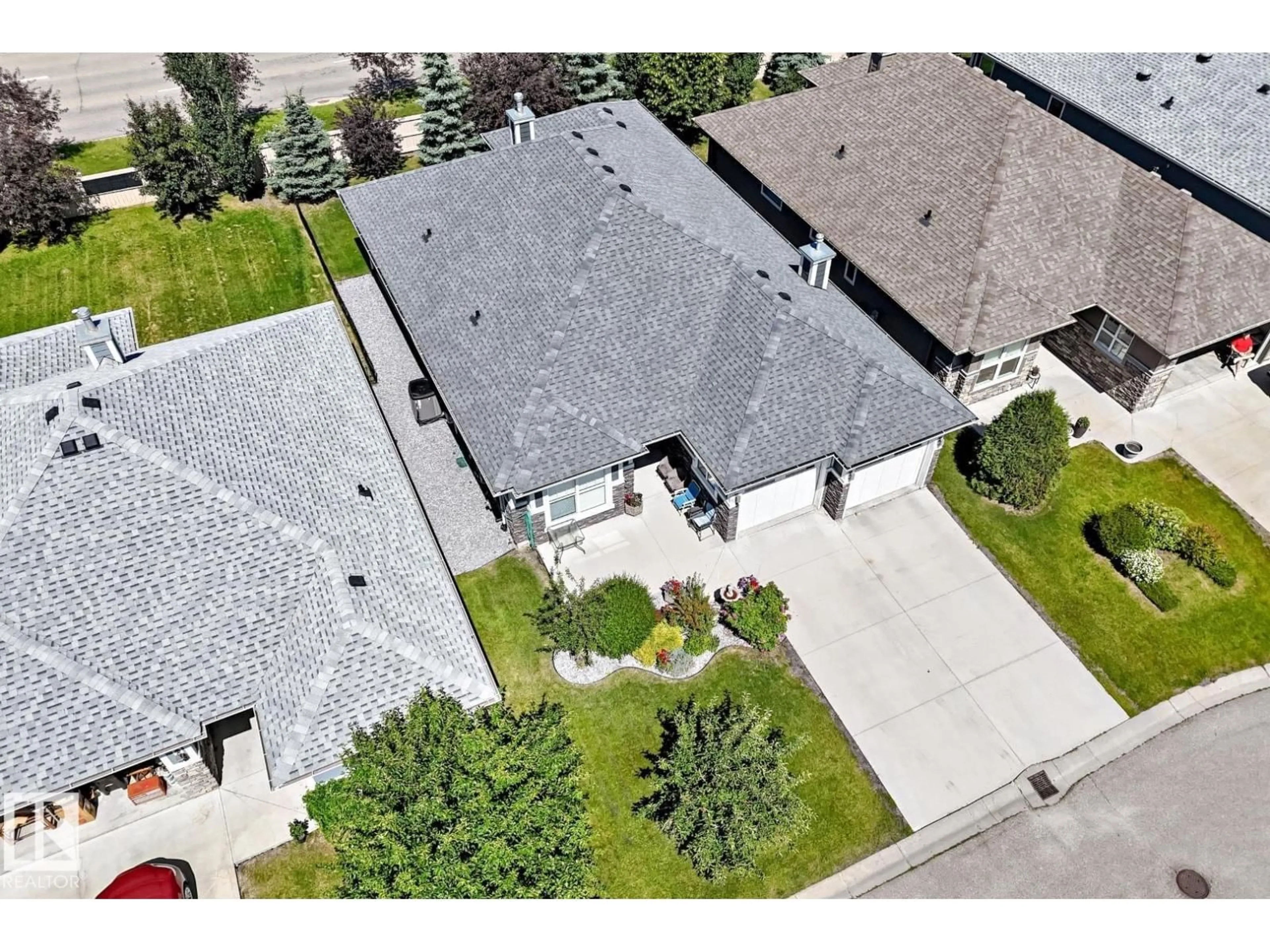 A pic from outside/outdoor area/front of a property/back of a property/a pic from drone, street for 18343 - 57 LESSARD RD, Edmonton Alberta T6A0A2