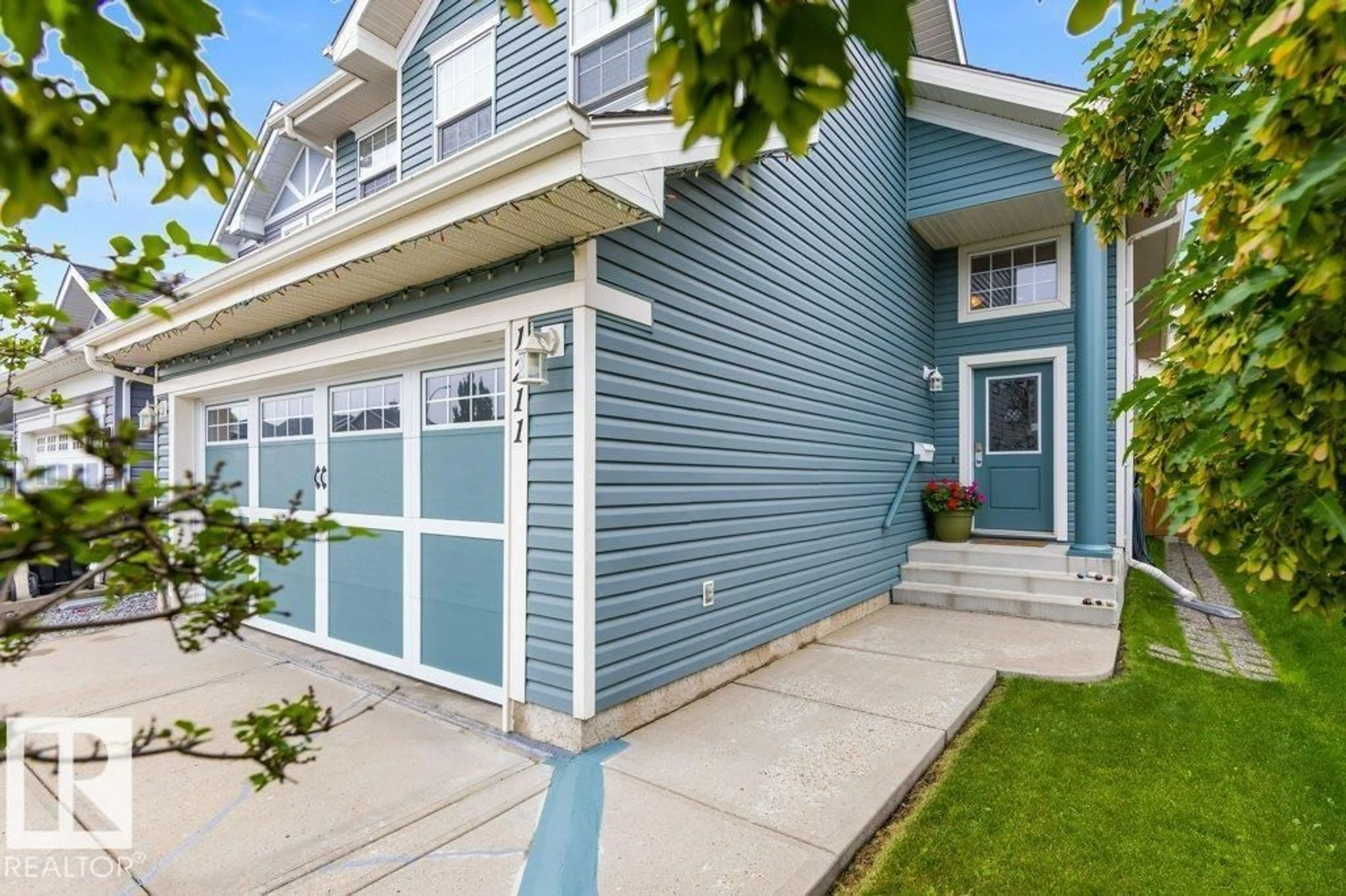 Home with vinyl exterior material, street for 1211 APPLETON CL, Sherwood Park Alberta T8G0G5