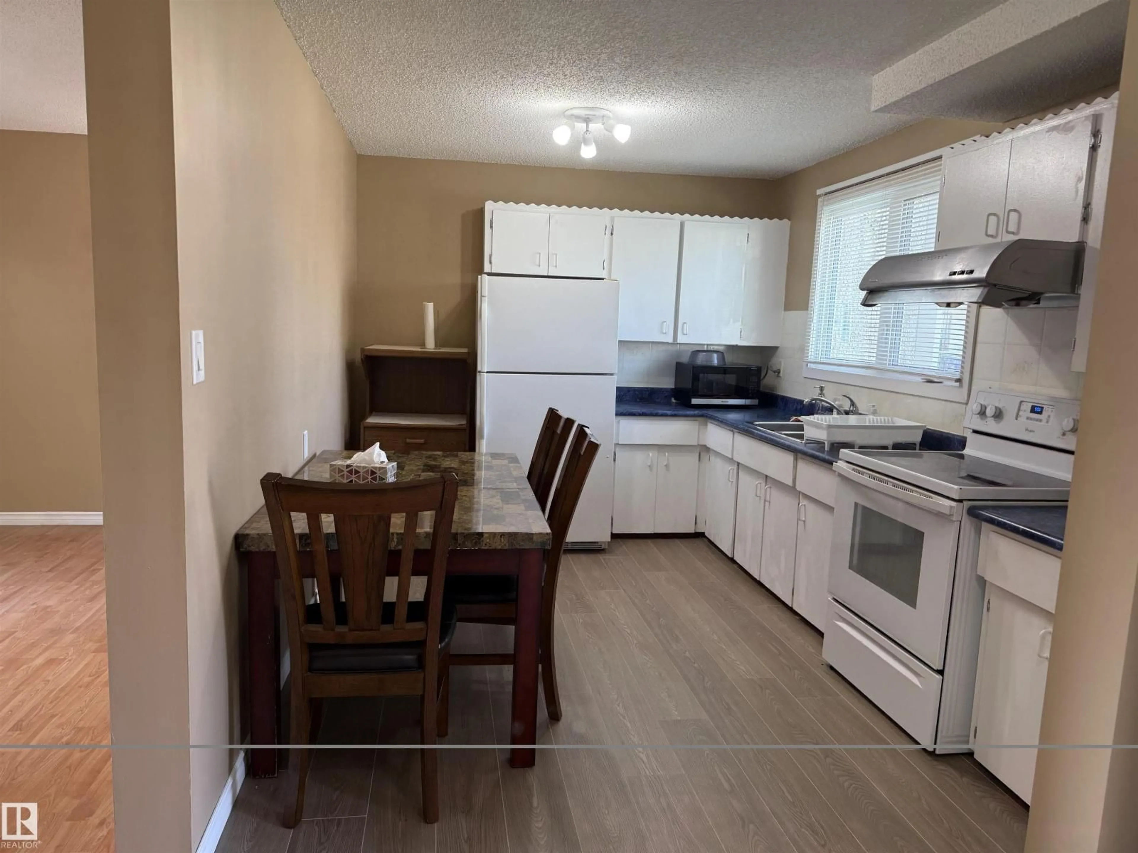 Standard kitchen, wood/laminate floor for 5645 137 AV, Edmonton Alberta T5A2H4
