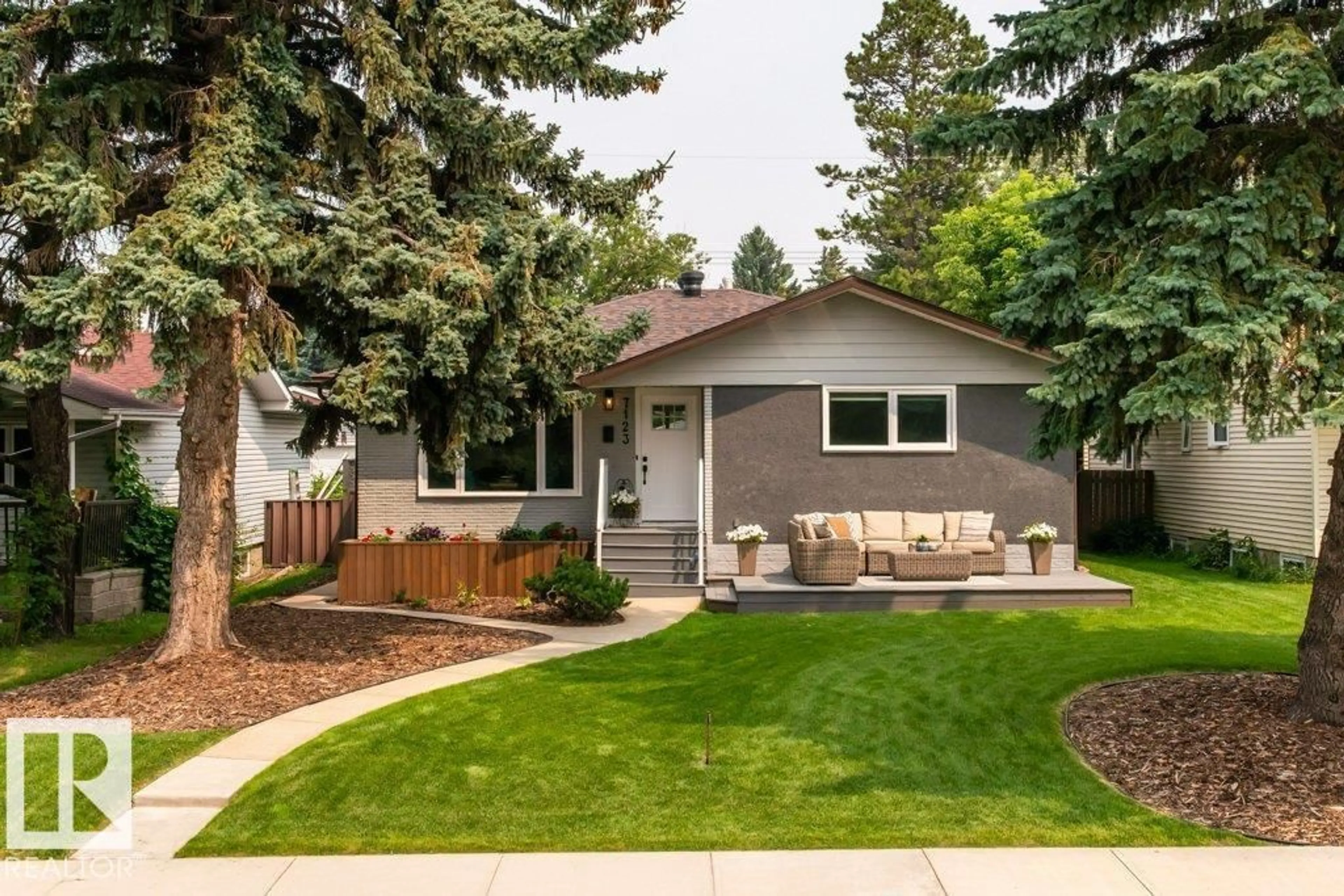 Home with vinyl exterior material, street for NW - 7123 87 ST, Edmonton Alberta T6C3G1