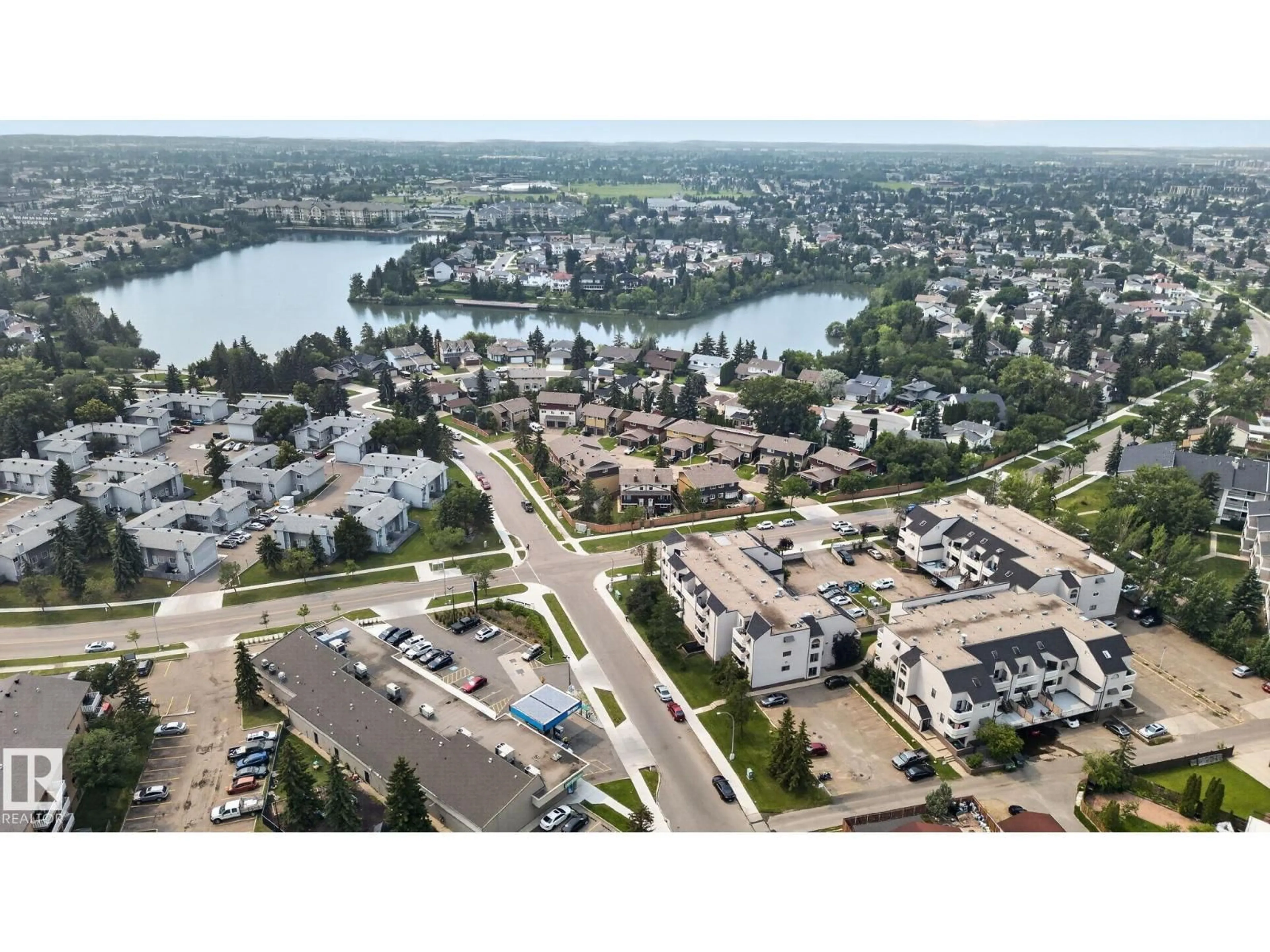 A pic from outside/outdoor area/front of a property/back of a property/a pic from drone, water/lake/river/ocean view for 10644 158 AV, Edmonton Alberta T5X4H5