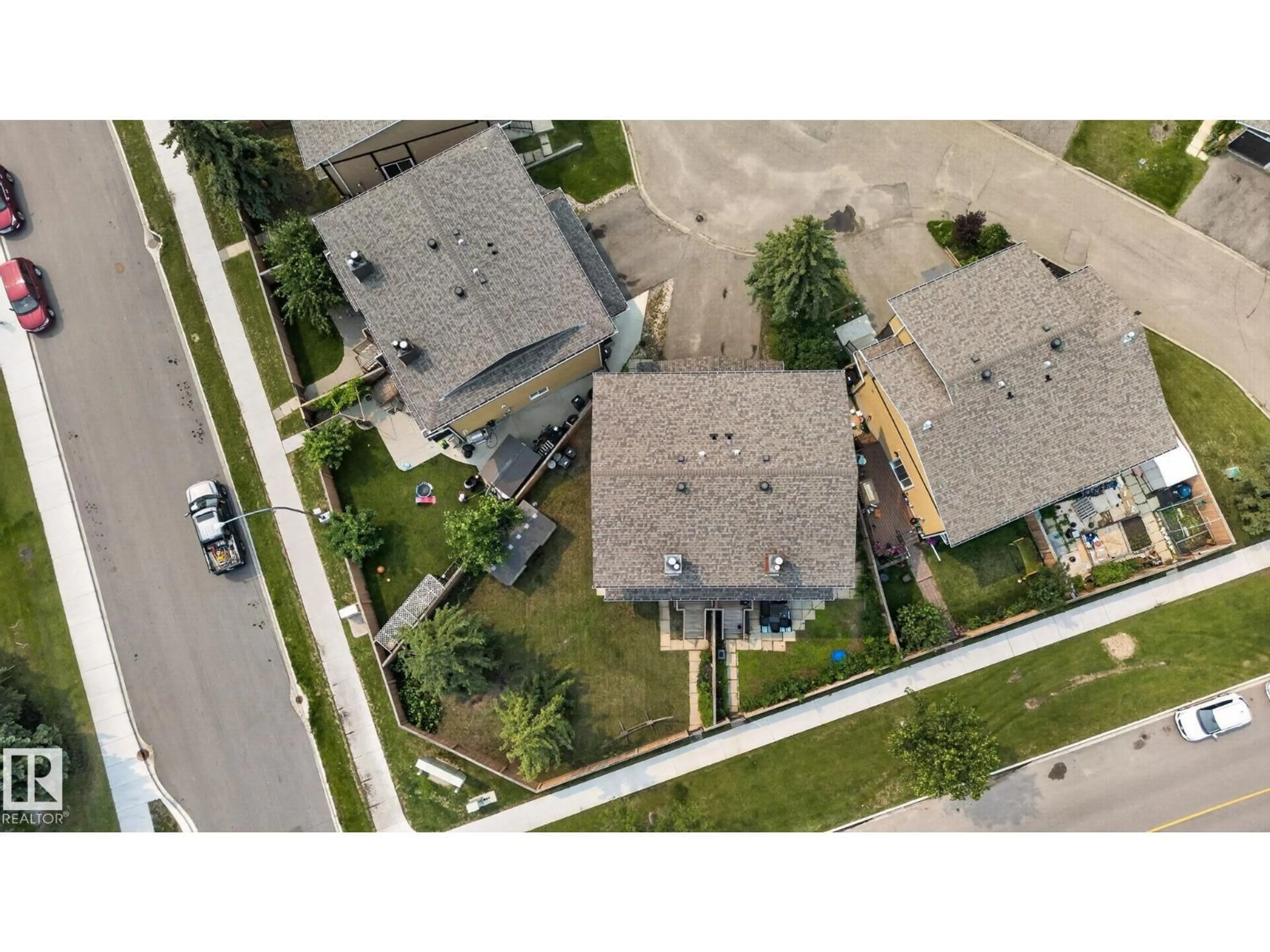 A pic from outside/outdoor area/front of a property/back of a property/a pic from drone, street for 10644 158 AV, Edmonton Alberta T5X4H5
