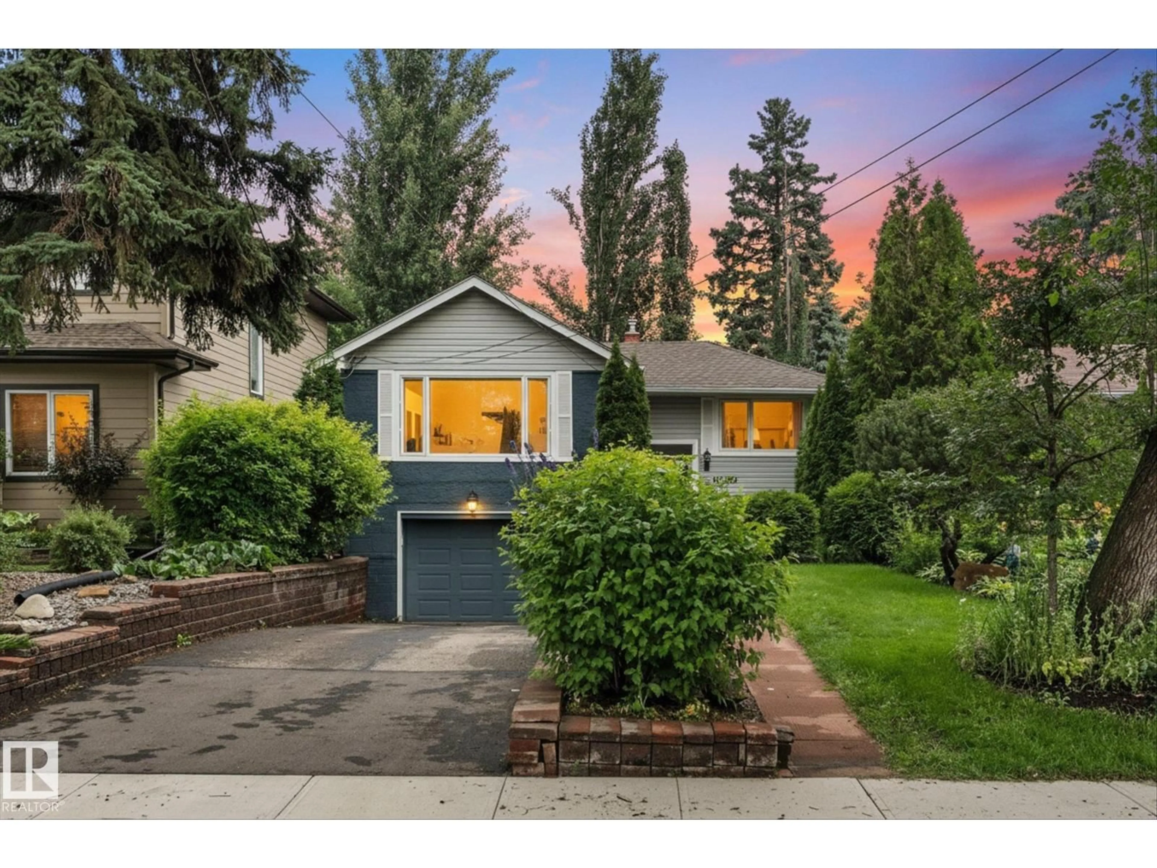 Home with vinyl exterior material, street for NW - 10810 54 AV, Edmonton Alberta T6H0T9