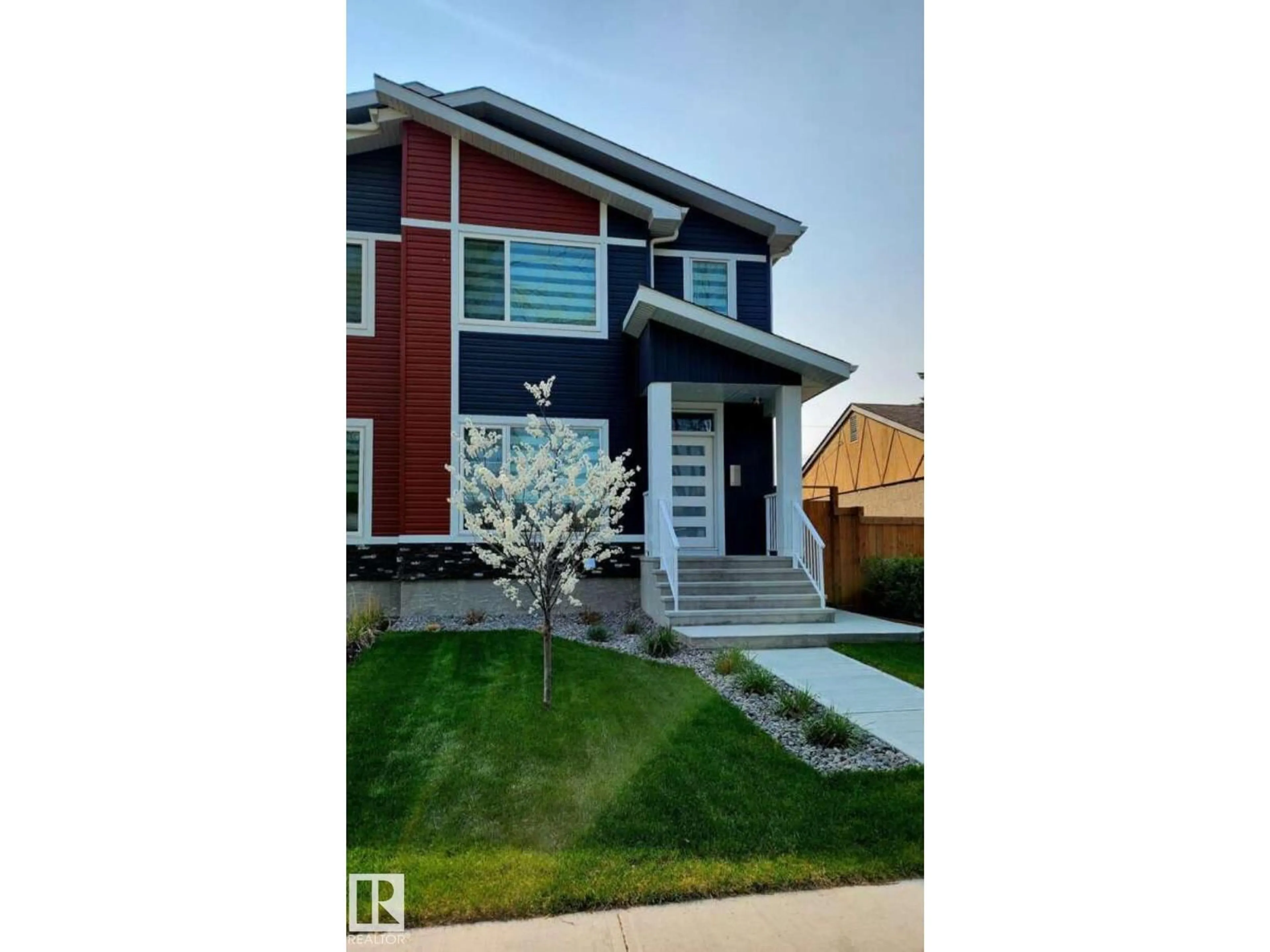 Home with vinyl exterior material, street for NW - 13026 120 ST, Edmonton Alberta T5E5N9