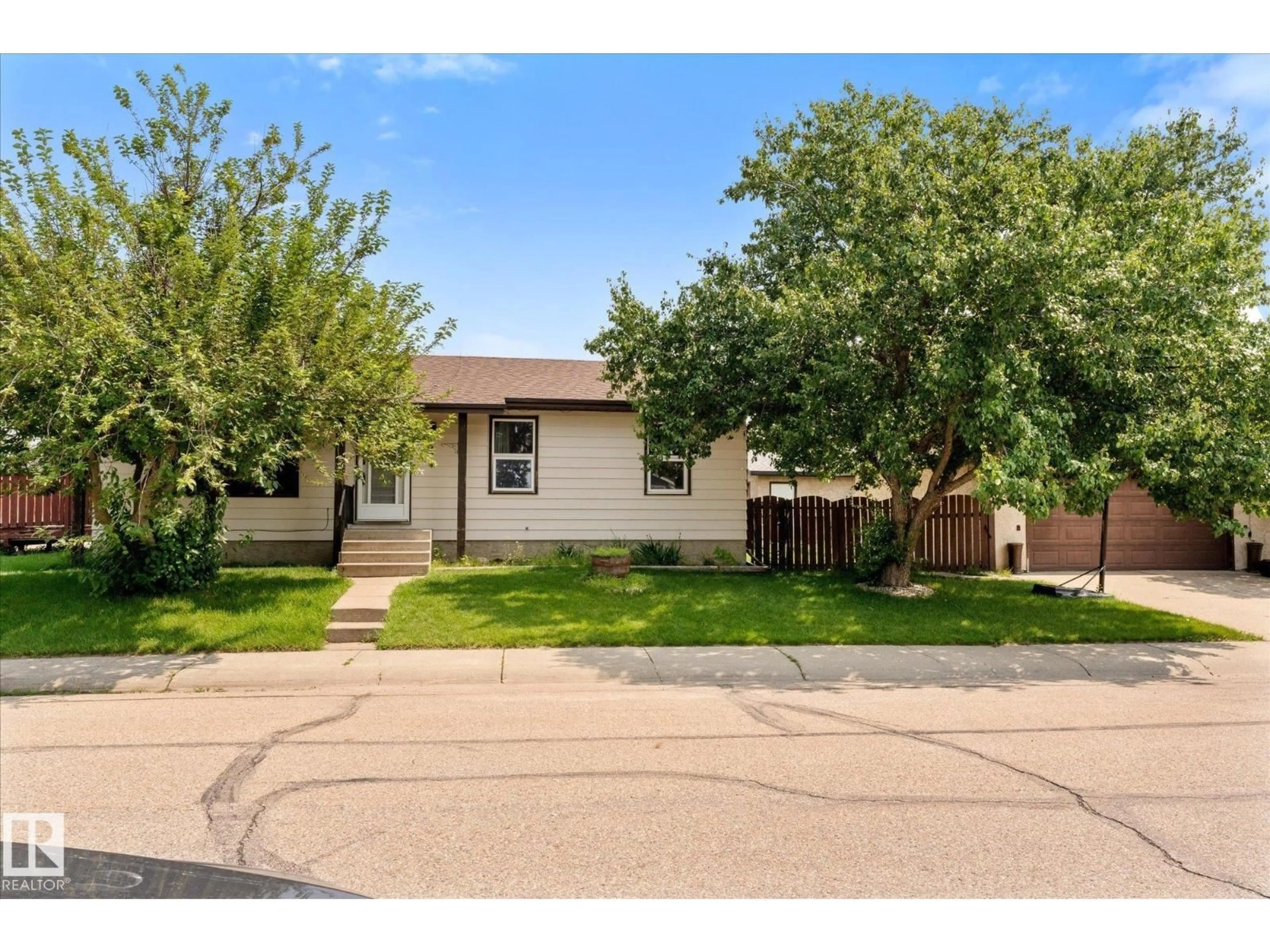 Home with vinyl exterior material, street for 42 MCNABB CR, Stony Plain Alberta T7Z1G8