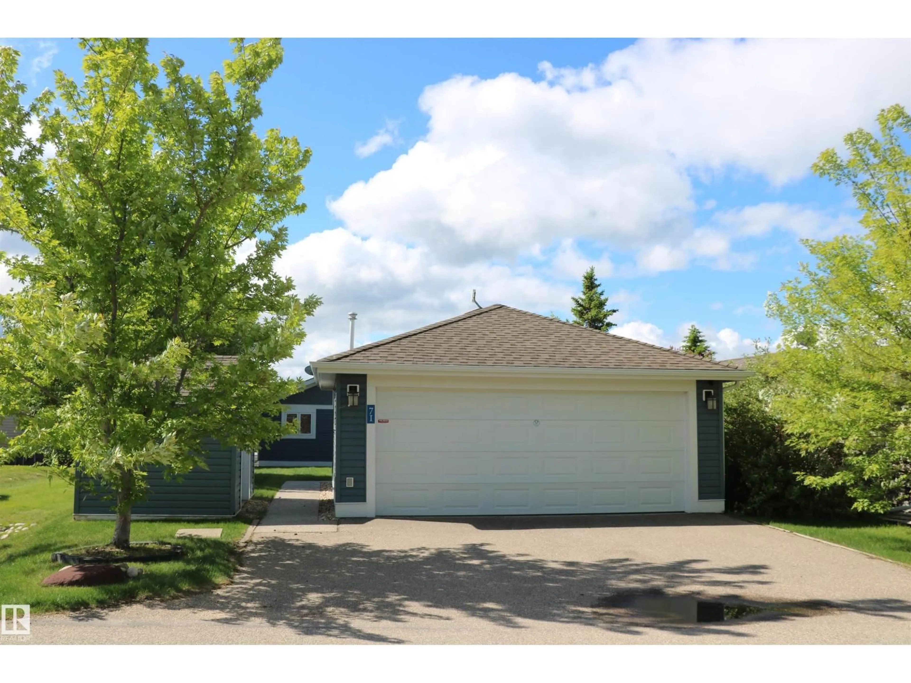 Home with vinyl exterior material, street for STE. 55101 - 71 ANNE TR, Rural Lac Ste. Anne County Alberta T0E1A1