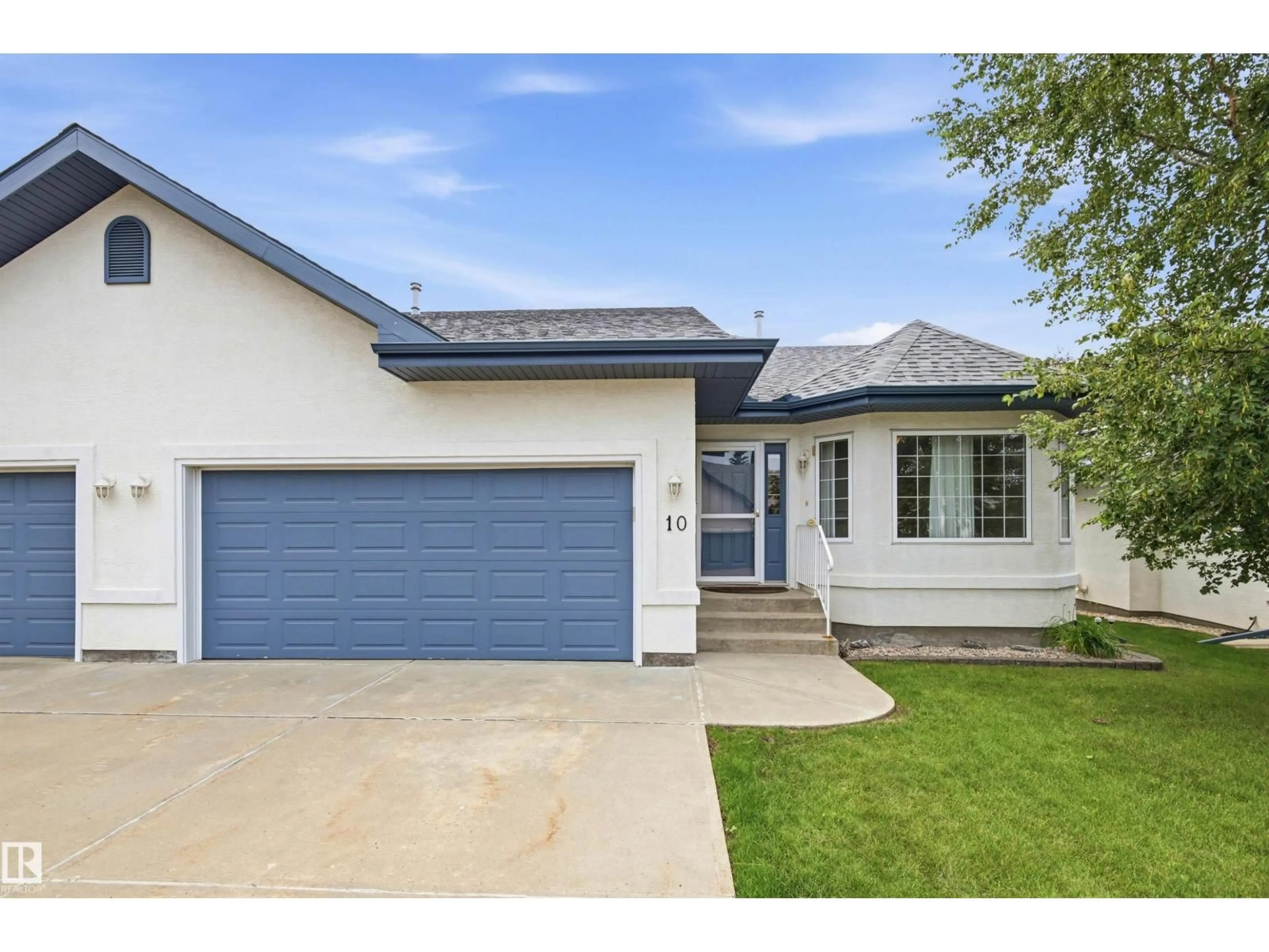 Home with brick exterior material, street for 9 - 10 DECHENE RD, Edmonton Alberta T6M2V1
