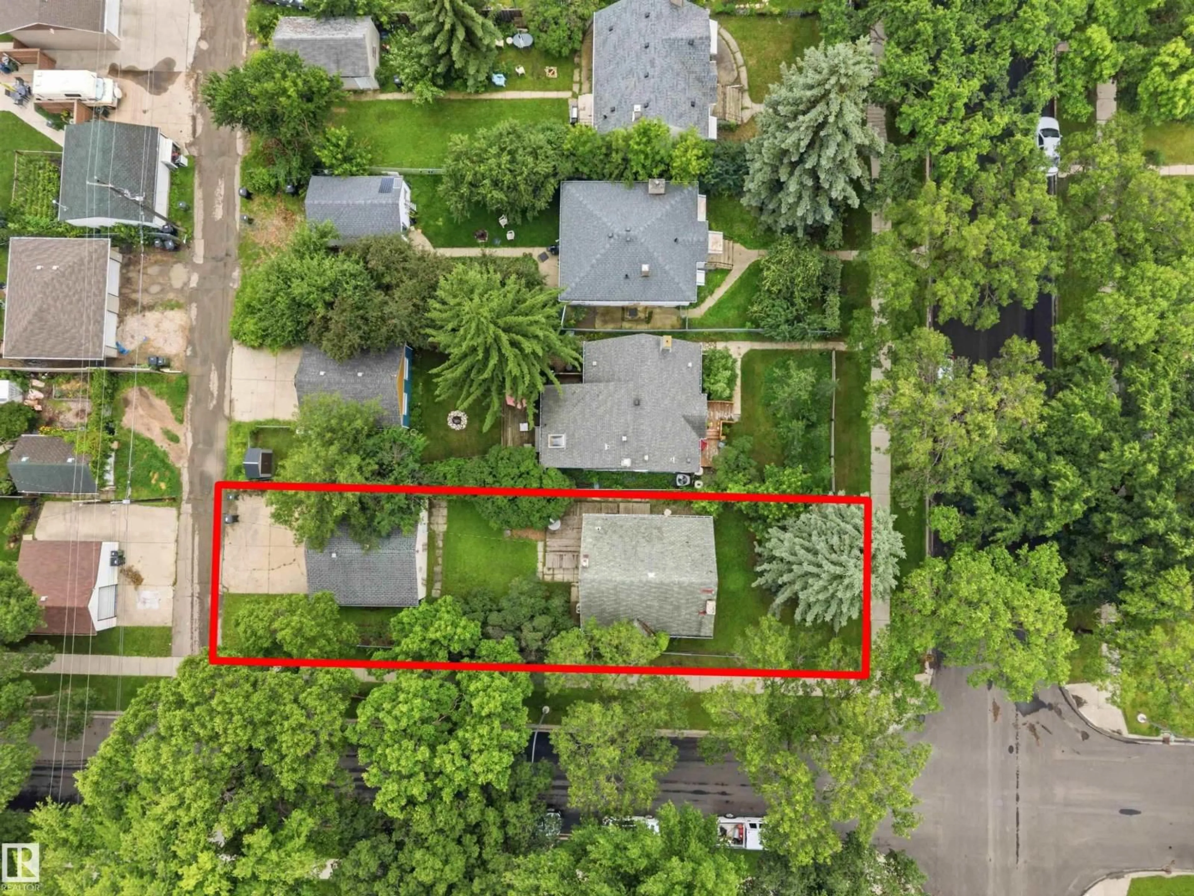 A pic from outside/outdoor area/front of a property/back of a property/a pic from drone, street for 12243 104 ST, Edmonton Alberta T5G2L7