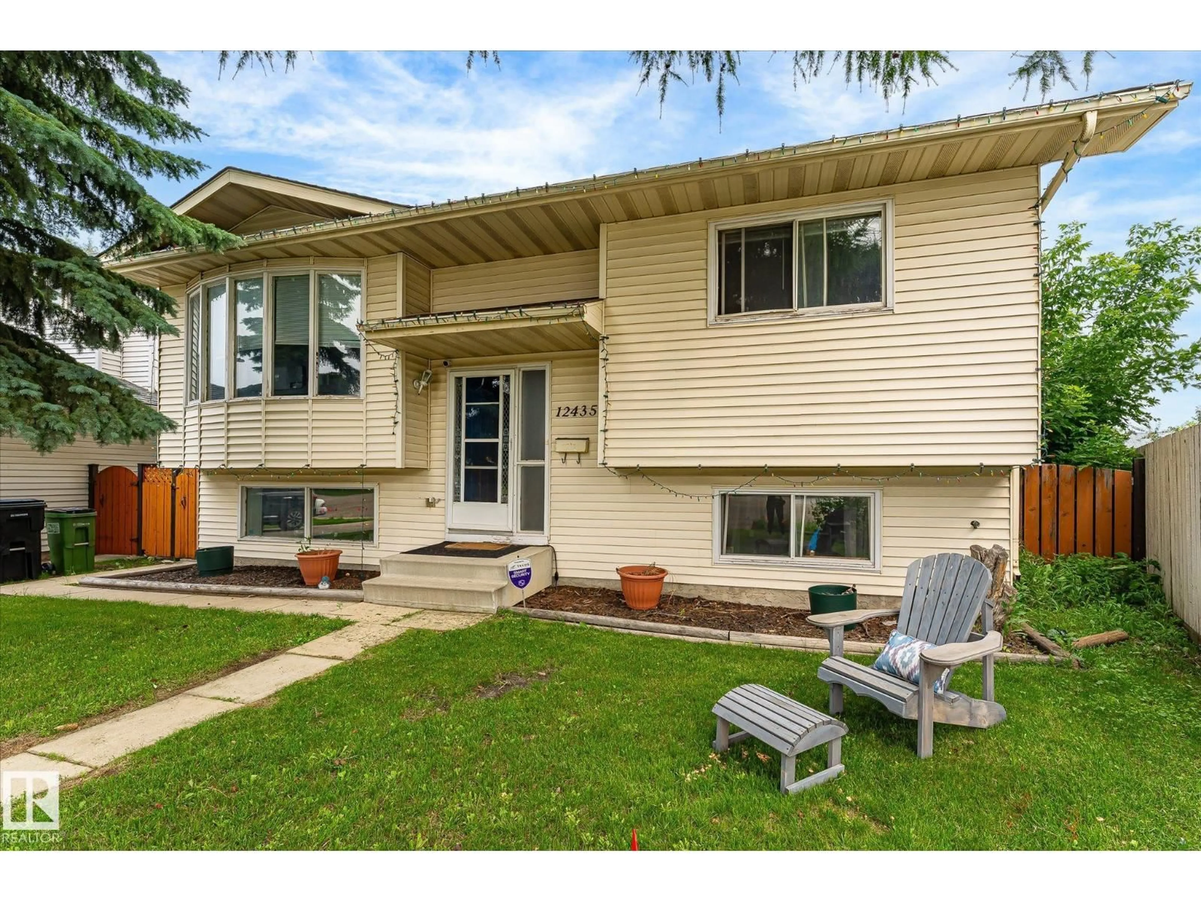 Home with vinyl exterior material, street for NW - 12435 46 ST, Edmonton Alberta T5W5E2