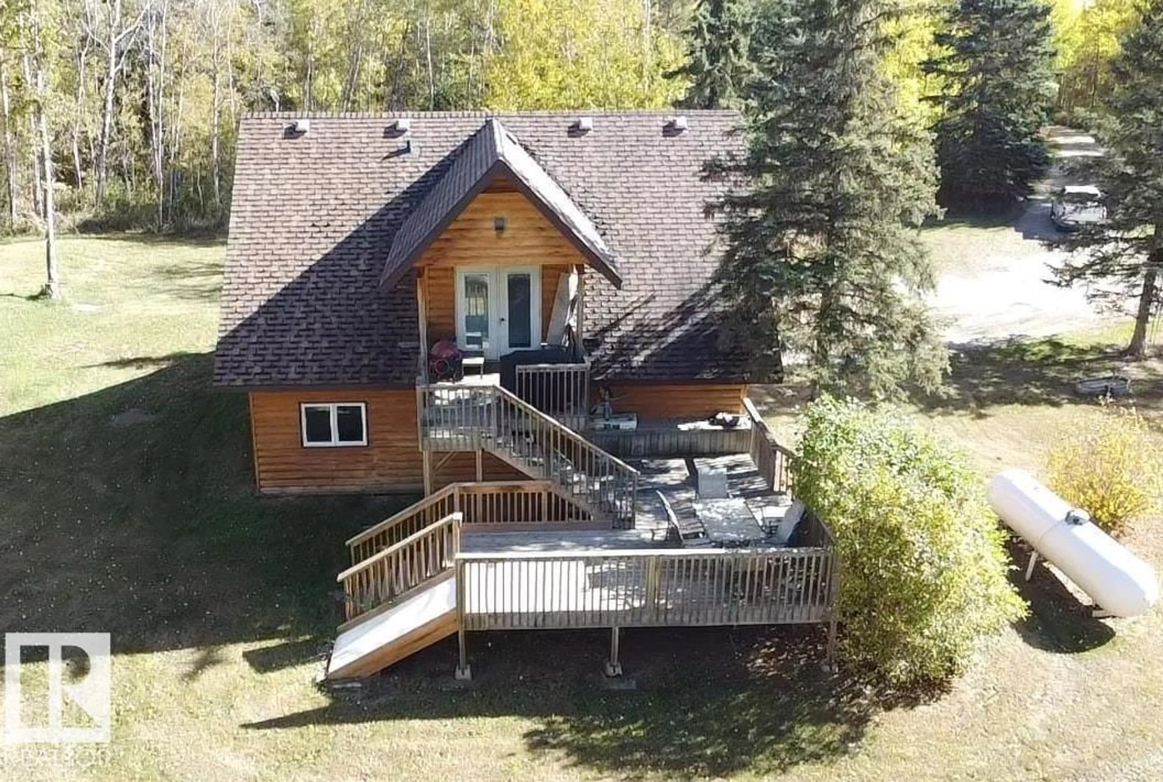 A pic from outside/outdoor area/front of a property/back of a property/a pic from drone, mountain view for 63106 RGE RD 471, Rural Bonnyville M.D. Alberta T9N2J6