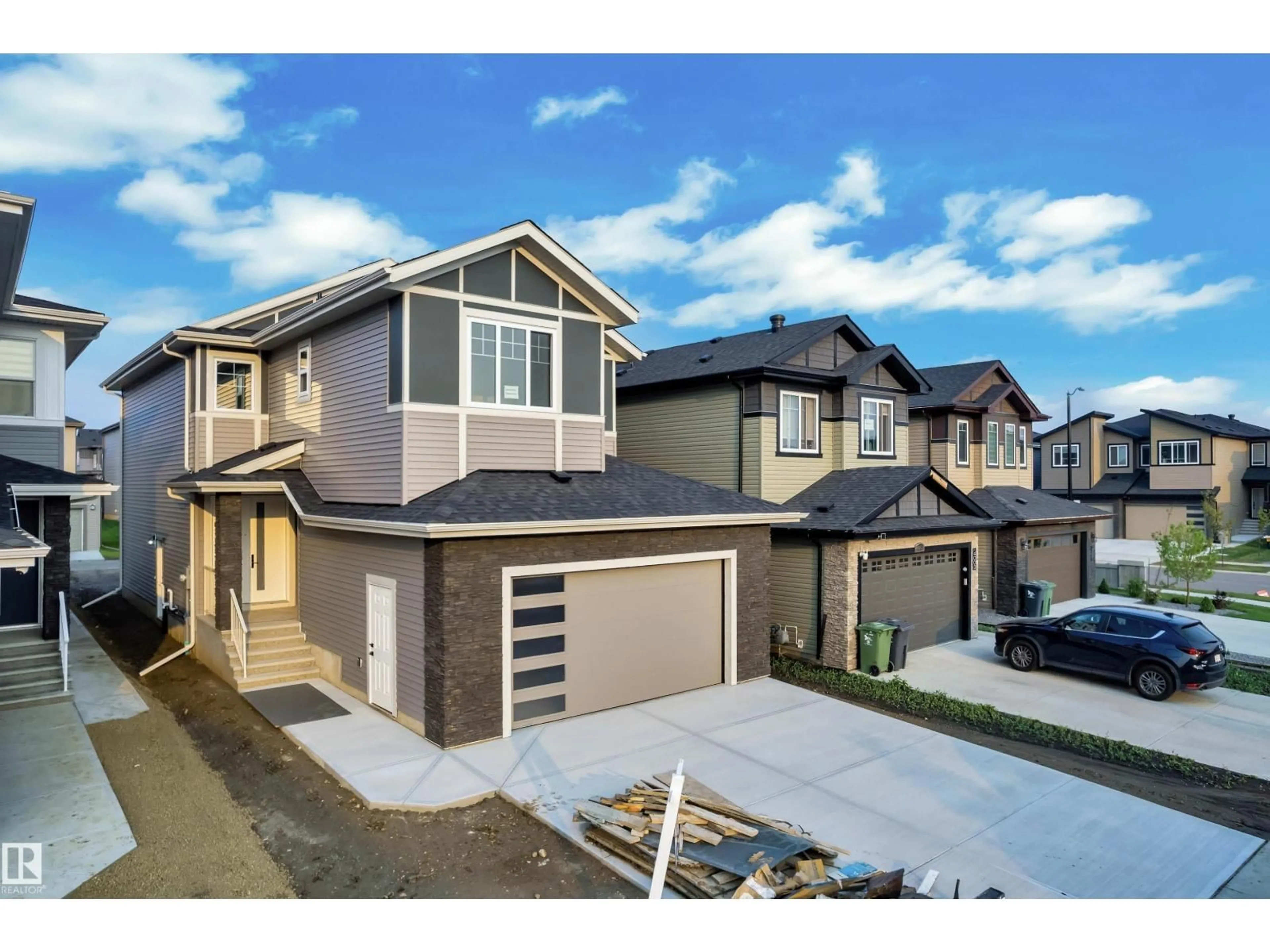 A pic from outside/outdoor area/front of a property/back of a property/a pic from drone, street for 4005 39 ST, Beaumont Alberta T6X3B5