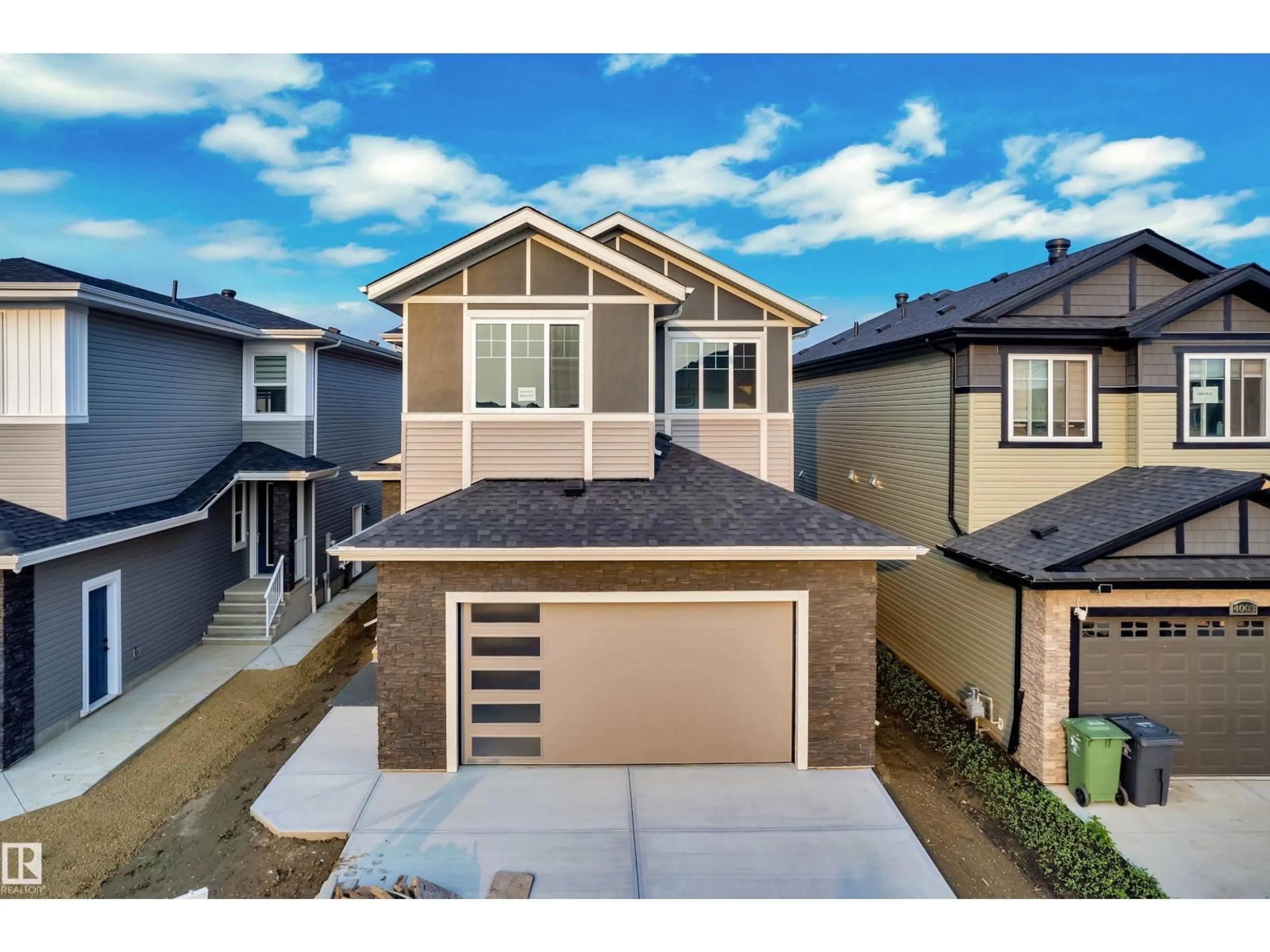 A pic from outside/outdoor area/front of a property/back of a property/a pic from drone, street for 4005 39 ST, Beaumont Alberta T6X3B5