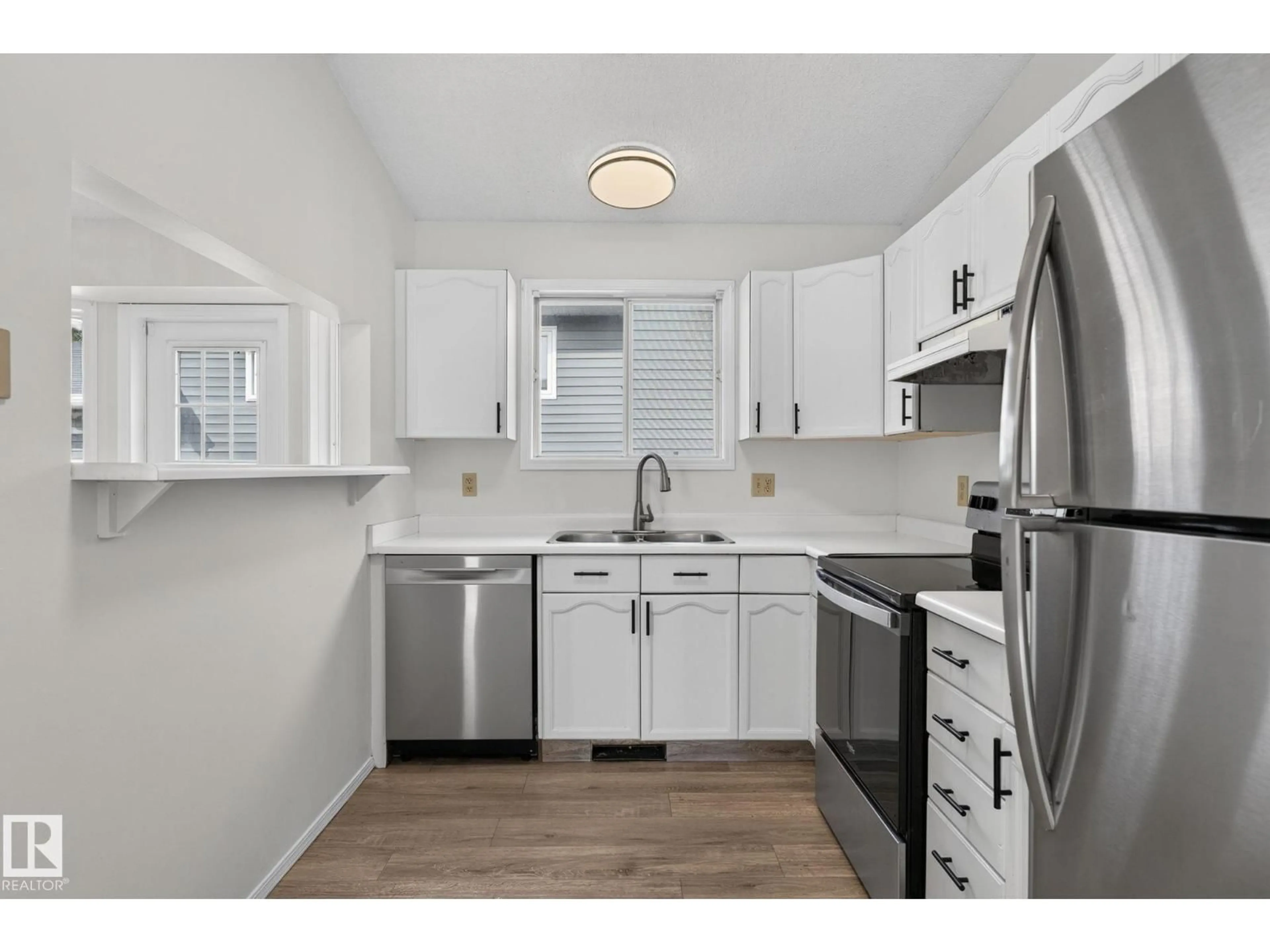 Standard kitchen, unknown for NW - 3722 34A AV, Edmonton Alberta T6L4Z2