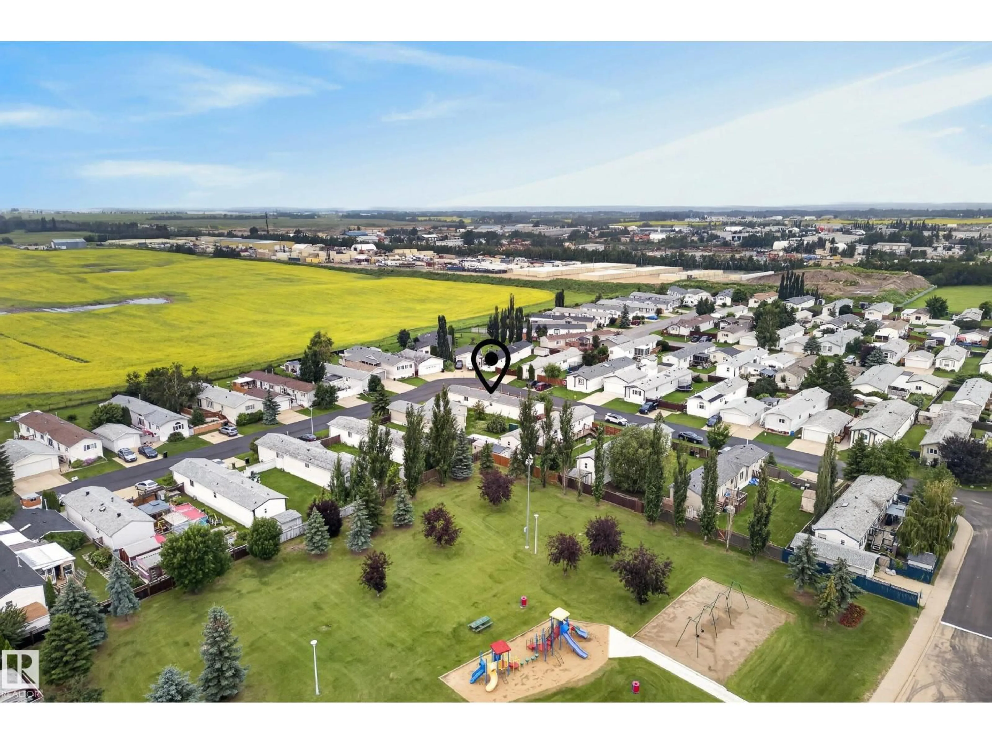 A pic from outside/outdoor area/front of a property/back of a property/a pic from drone, mountain view for 3338 LAKEVIEW RD, Edmonton Alberta T5S2R8