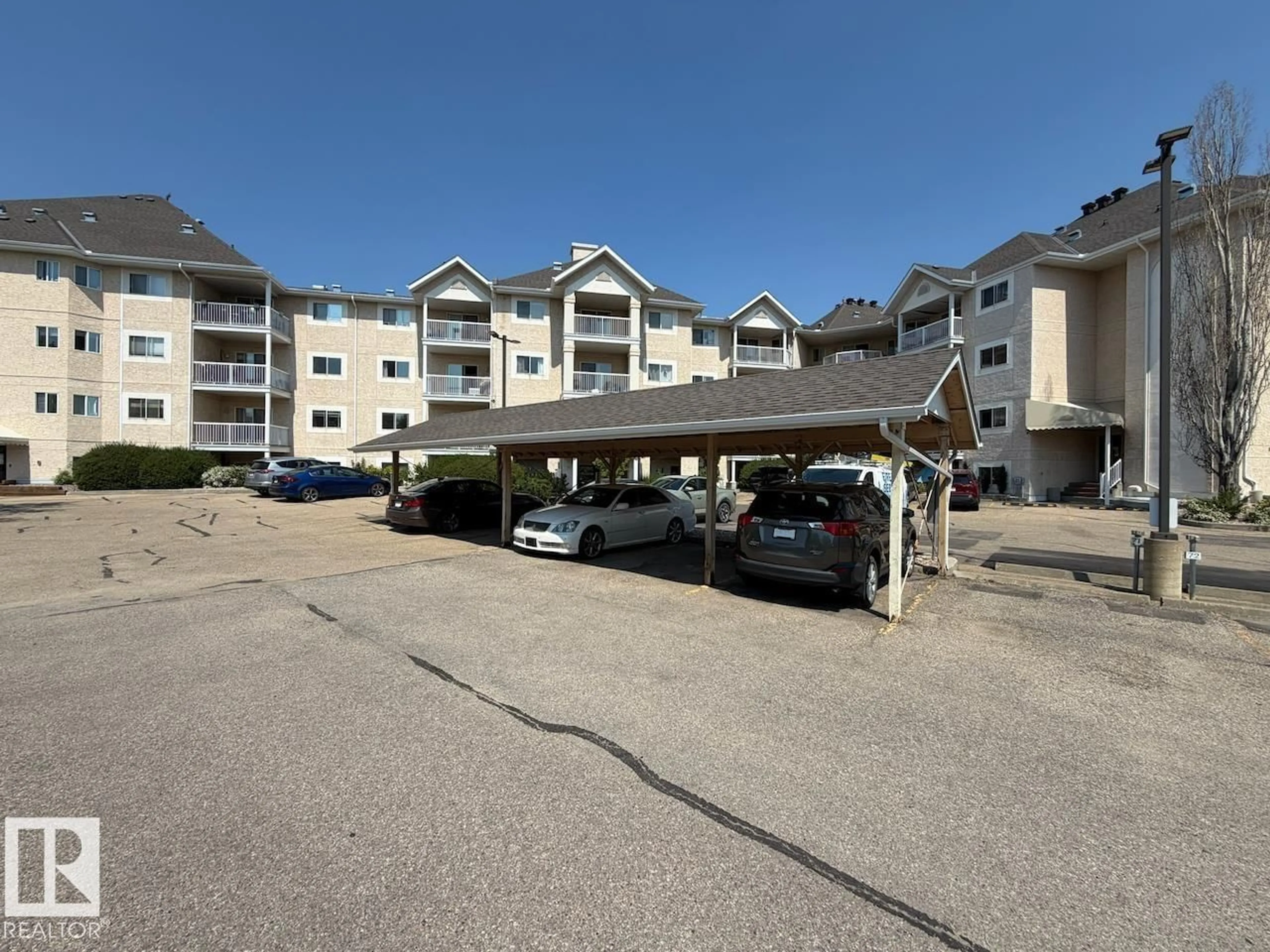 A pic from outside/outdoor area/front of a property/back of a property/a pic from drone, unknown for #312 - 11620 9A AV, Edmonton Alberta T6J7B4