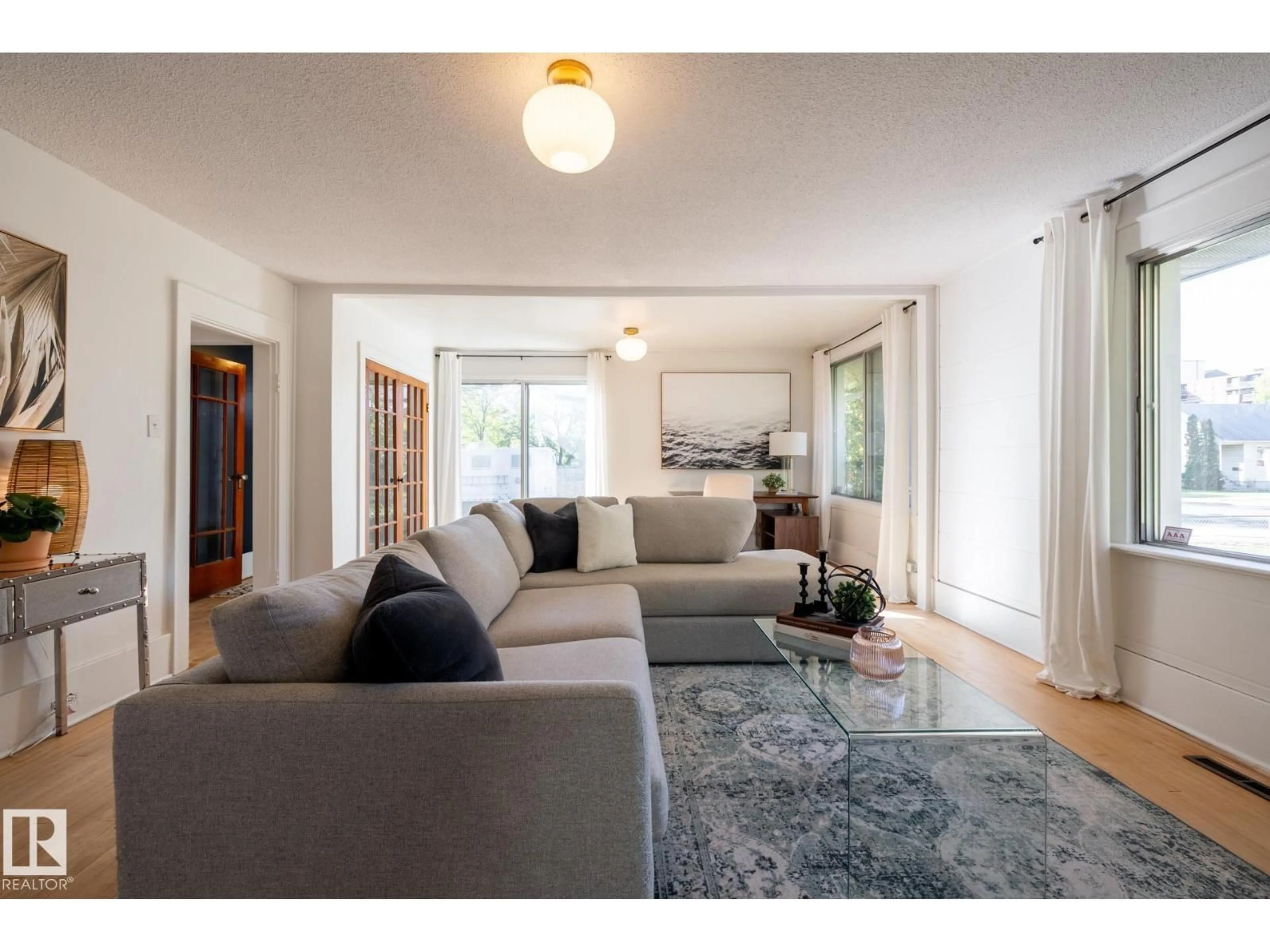Living room with furniture, unknown for 12628 112 AV, Edmonton Alberta T5M2T3