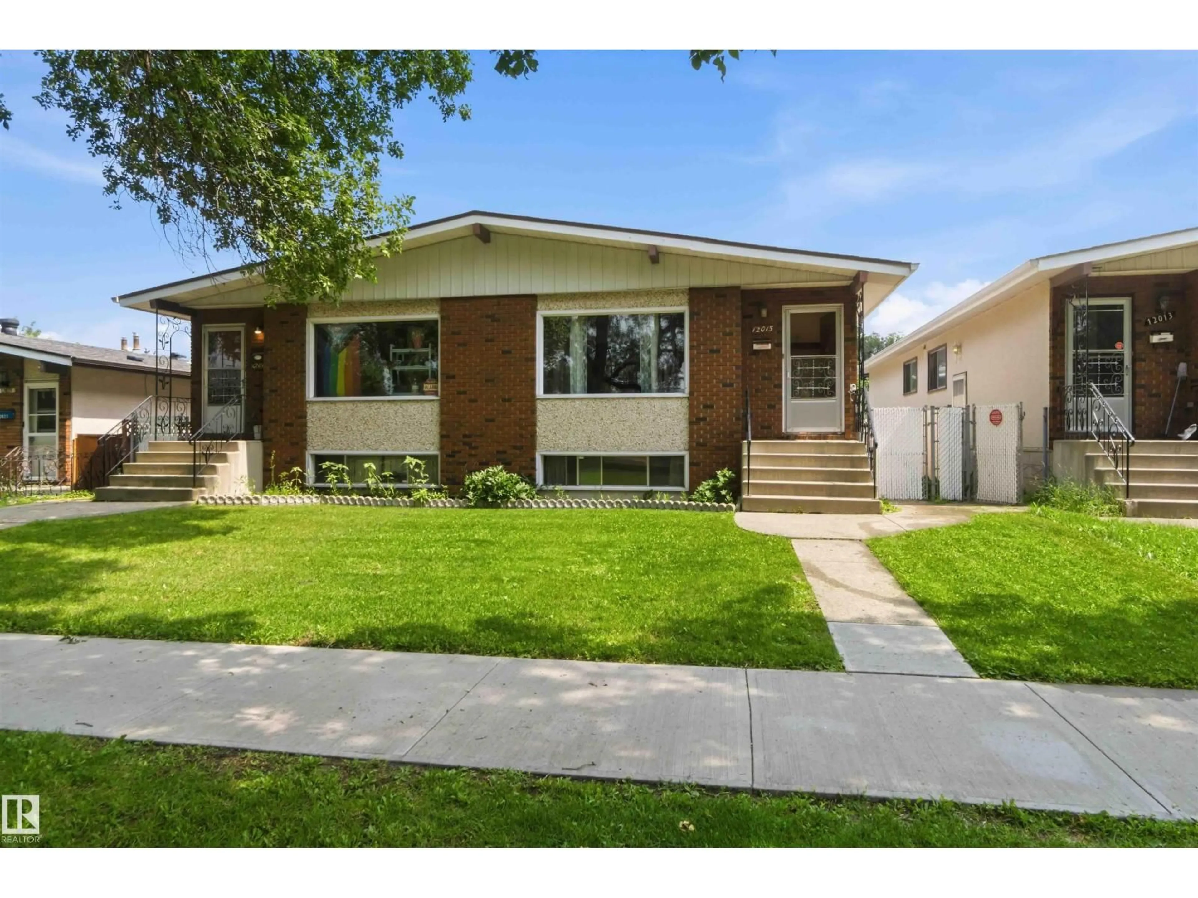 Home with brick exterior material, street for NW - 12015,12017 85 ST, Edmonton Alberta T5B3G4
