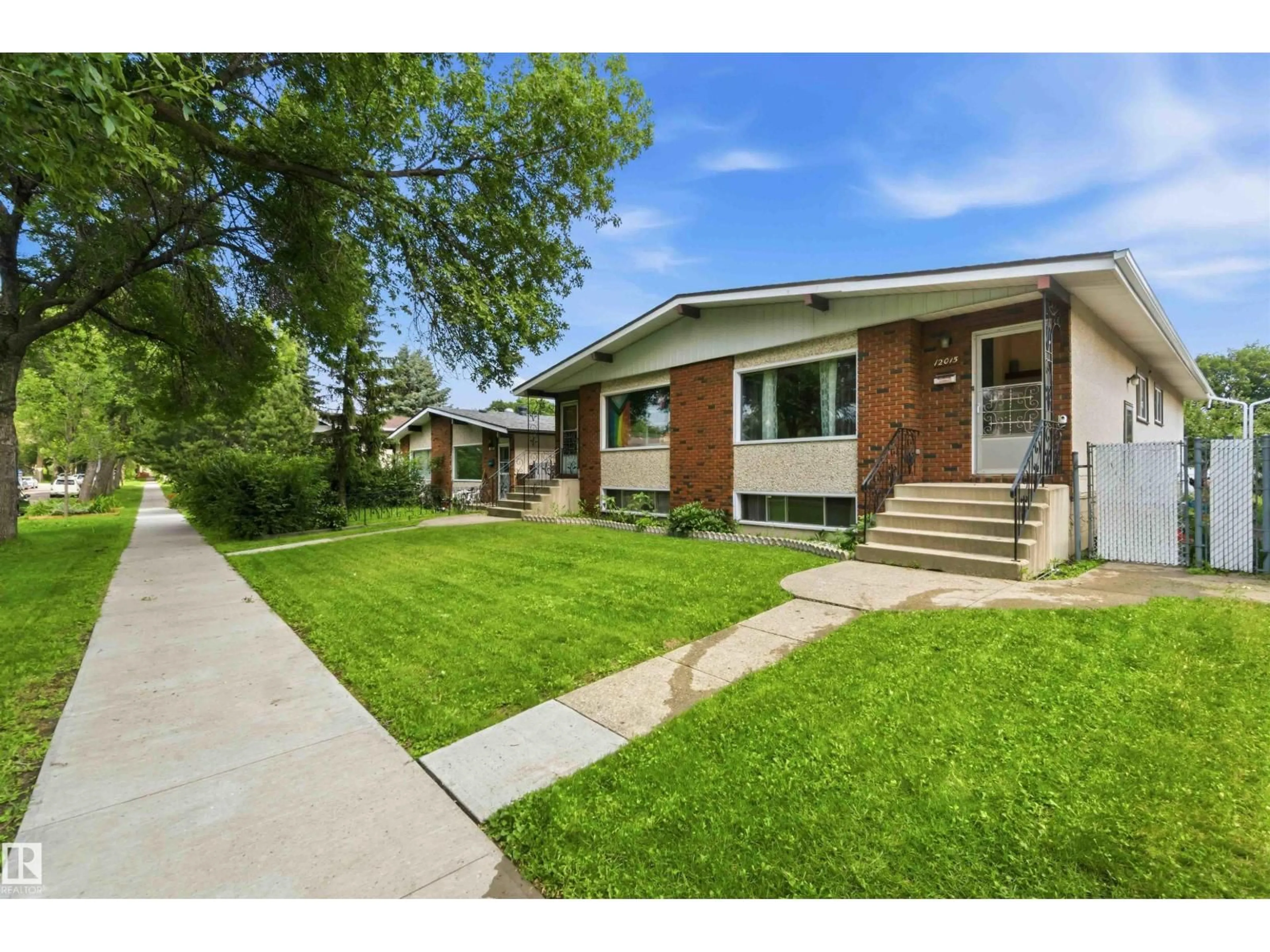 Home with brick exterior material, street for NW - 12015,12017 85 ST, Edmonton Alberta T5B3G4