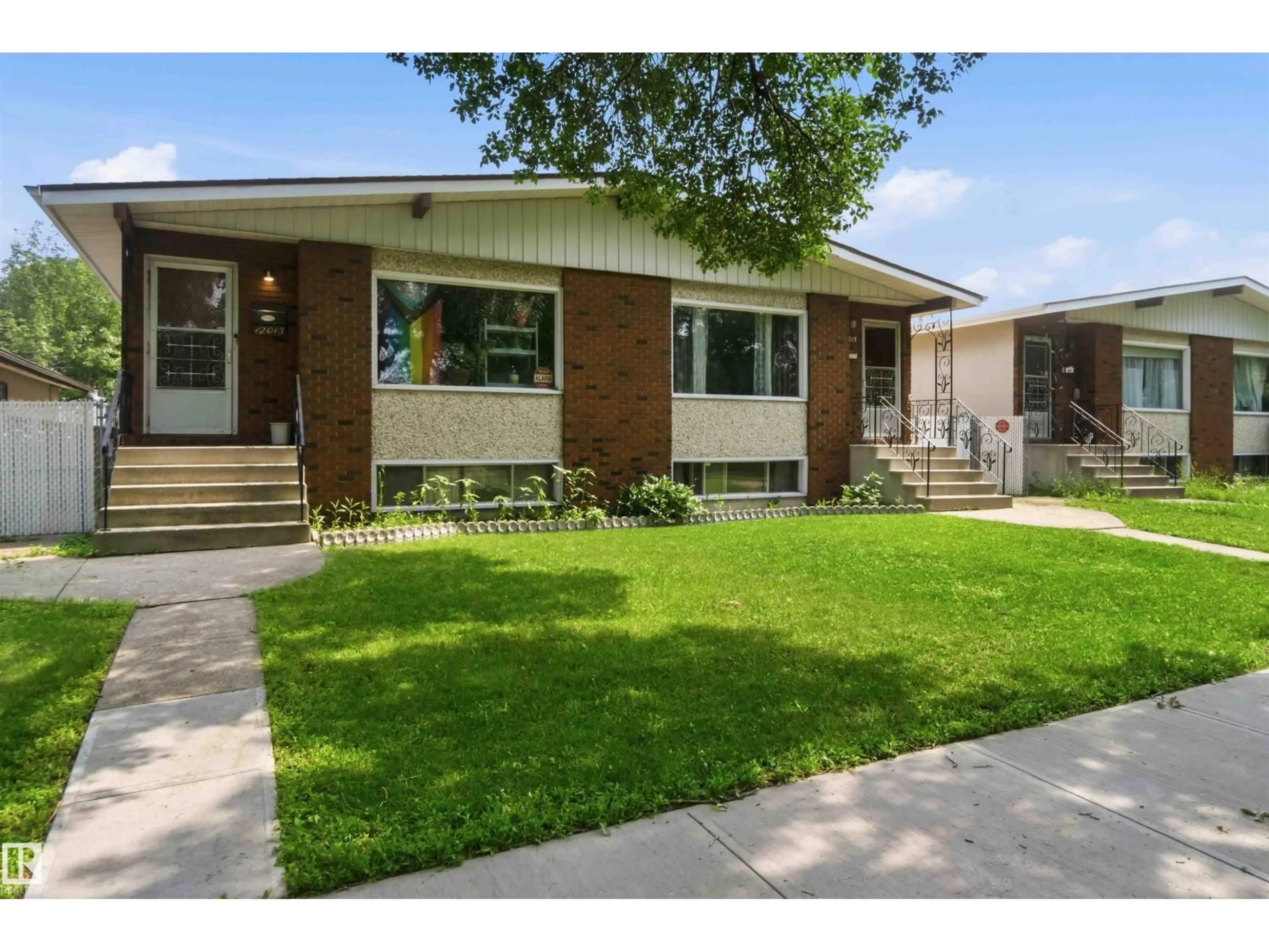 Home with brick exterior material, street for NW - 12015,12017 85 ST, Edmonton Alberta T5B3G4