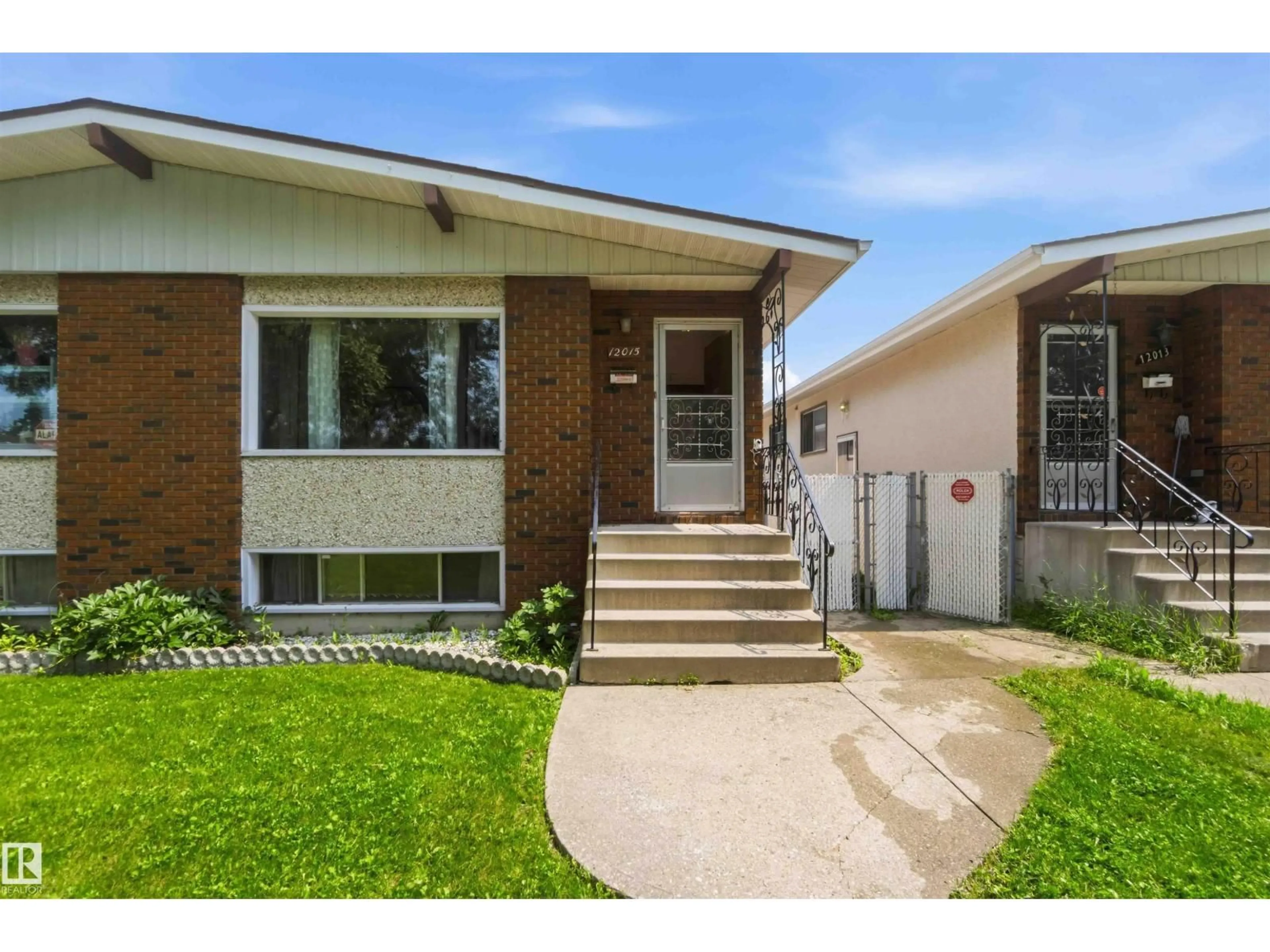 Home with brick exterior material, street for NW - 12015,12017 85 ST, Edmonton Alberta T5B3G4
