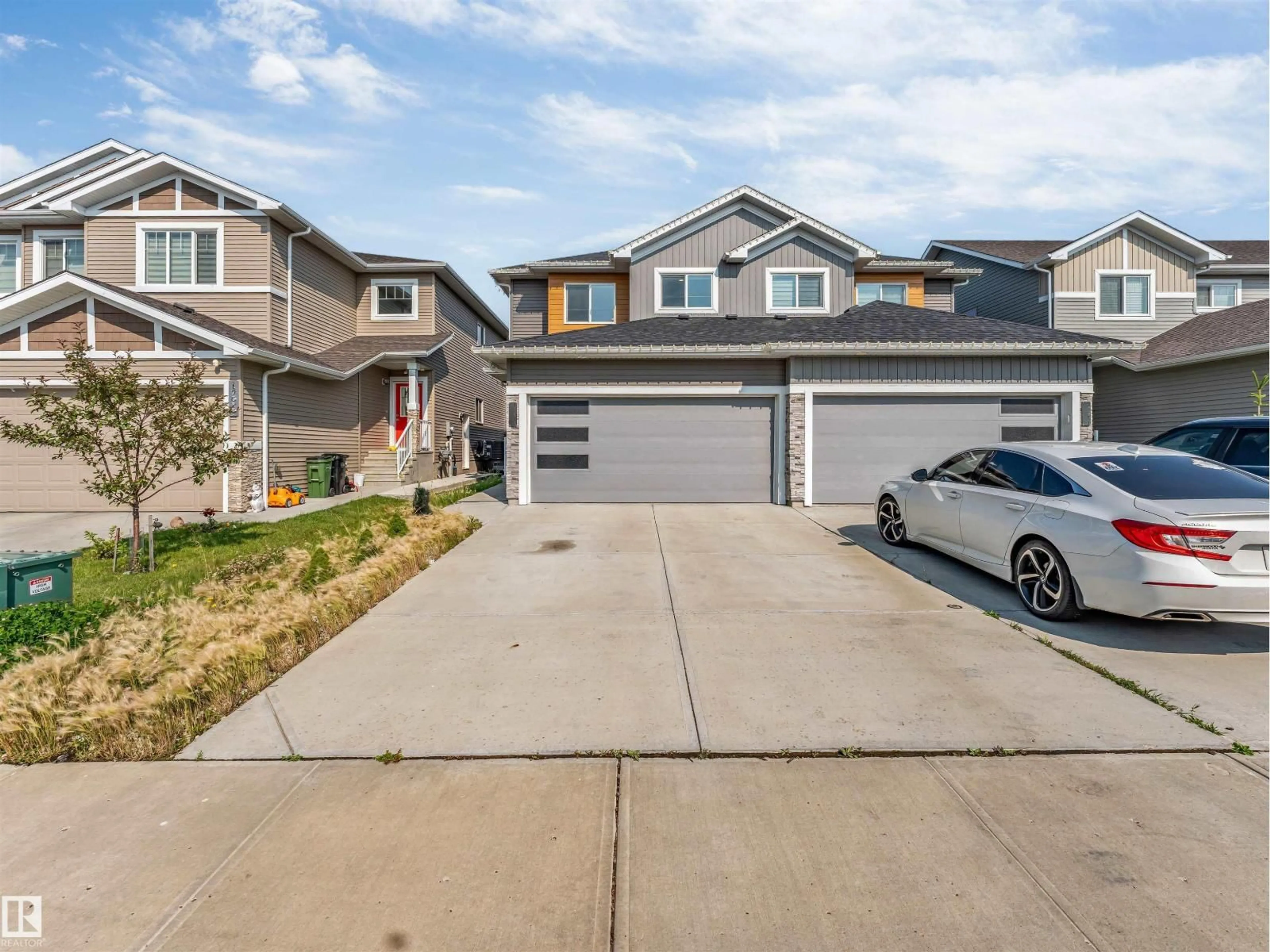Home with vinyl exterior material, street for NW - 17513 65 ST, Edmonton Alberta T5Y4A7