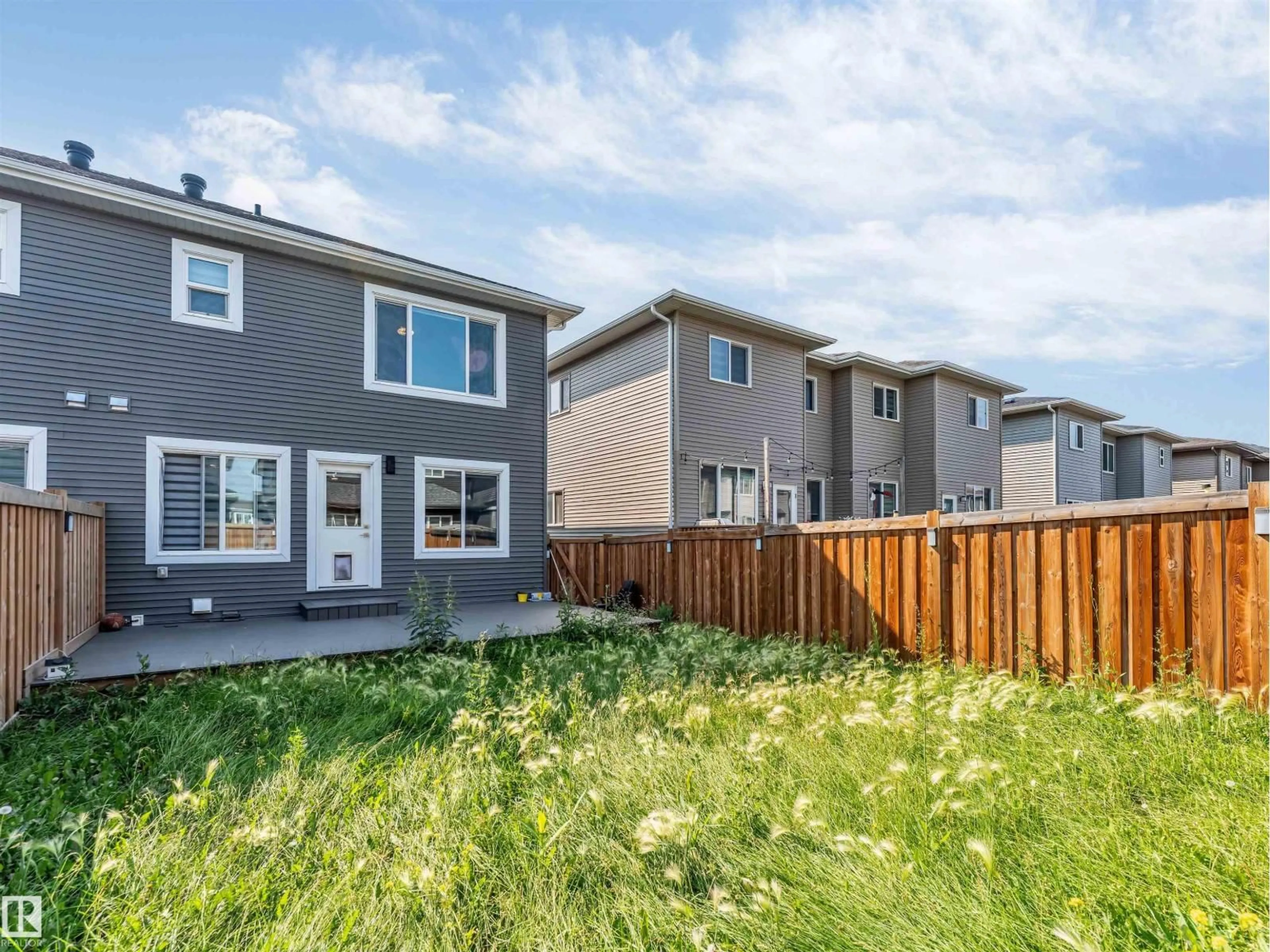 Home with vinyl exterior material, street for NW - 17513 65 ST, Edmonton Alberta T5Y4A7