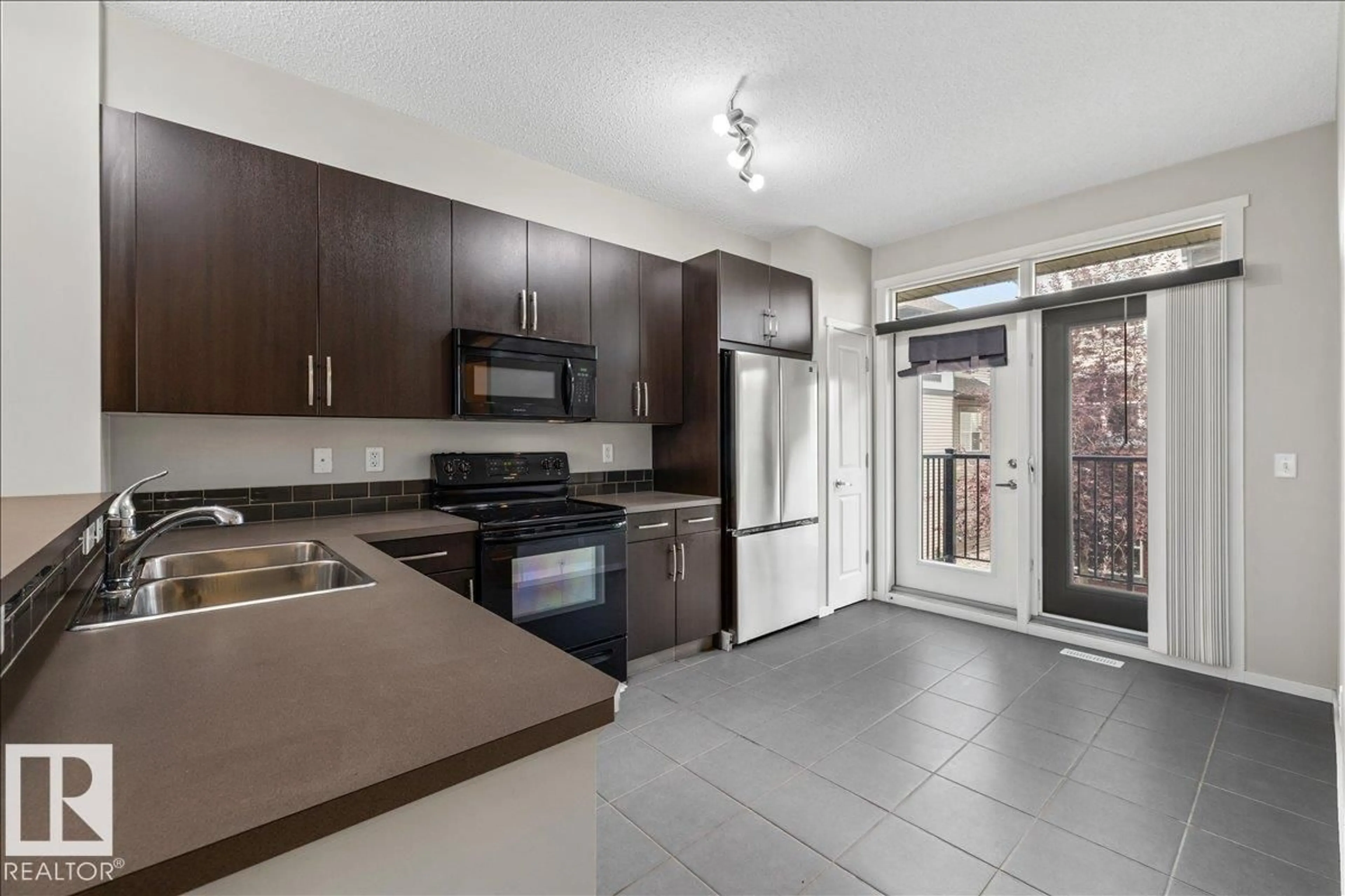 Open concept kitchen, unknown for 603 - 31 WATT BV, Edmonton Alberta T6X0P3