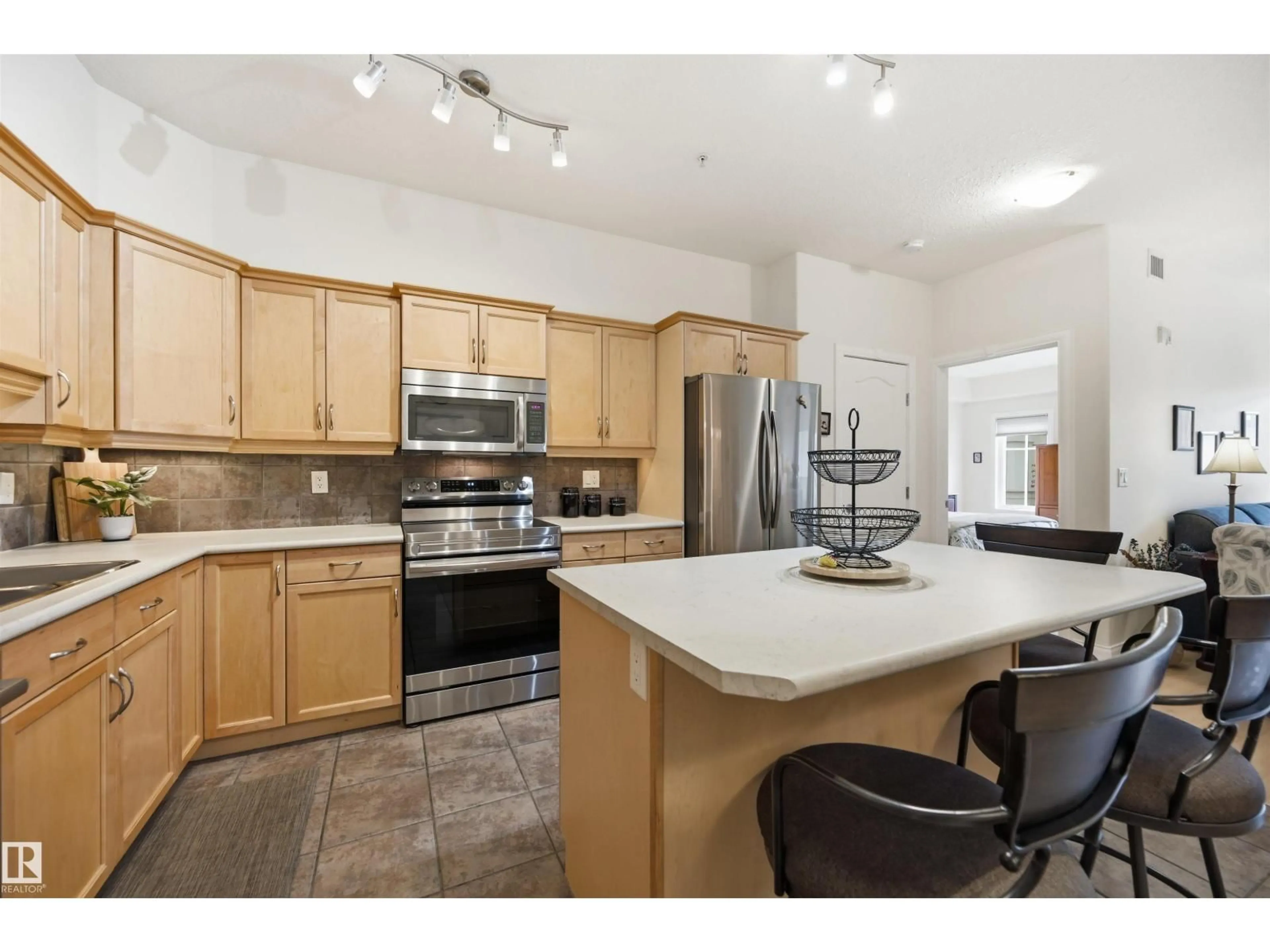 Open concept kitchen, unknown for #338 - 1406 HODGSON WY, Edmonton Alberta T6R3K1
